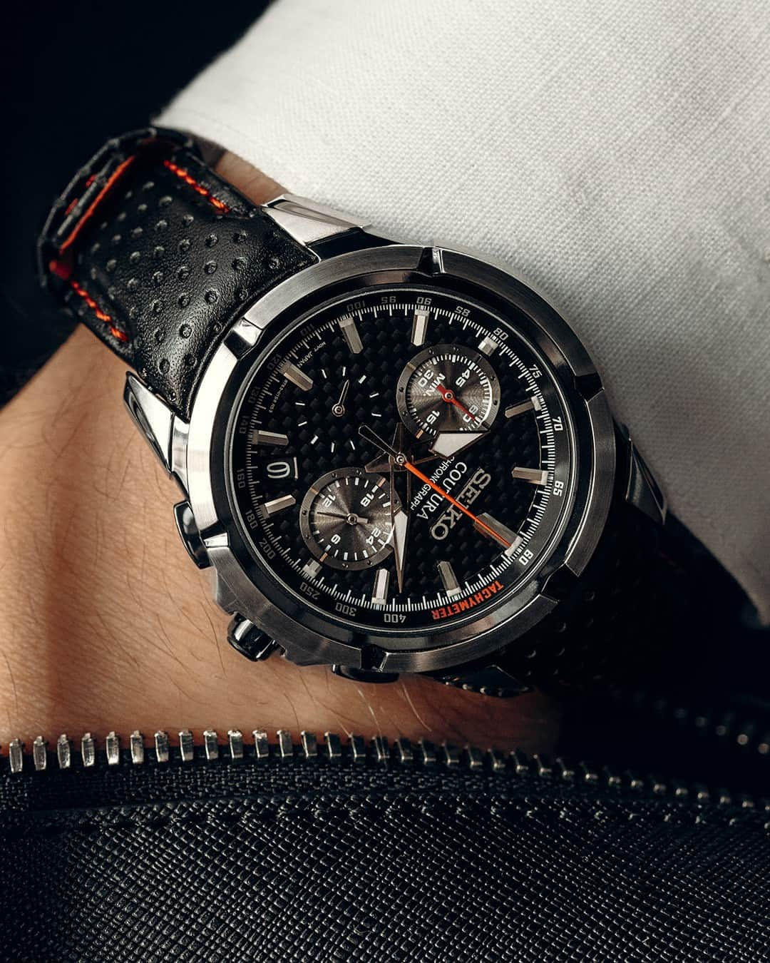 Seiko Watchesのインスタグラム：「Ready. Set, Hold Onto Your Seiko! 🏁 - #SSB437 takes first prize with these winning features!  Inspired by motor sports, this dashingly sculpted Coutura features a multi-layer carbon-fiber patterned black dial styled to suggest a dashboard and a black perforated leather strap with bold red contrast stitching designed to echo driving gloves.  #Seiko #SeikoCoutura」