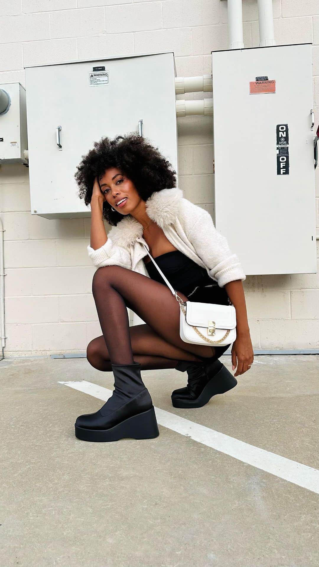 ALDO shoesのインスタグラム：「Try on moment with our girl @genesis_lagos styling retro-inspired Silo platform booties paired with Johnax handbag. Tap to shop your pair ❤️ #ALDOCrew #ALDOShoes」