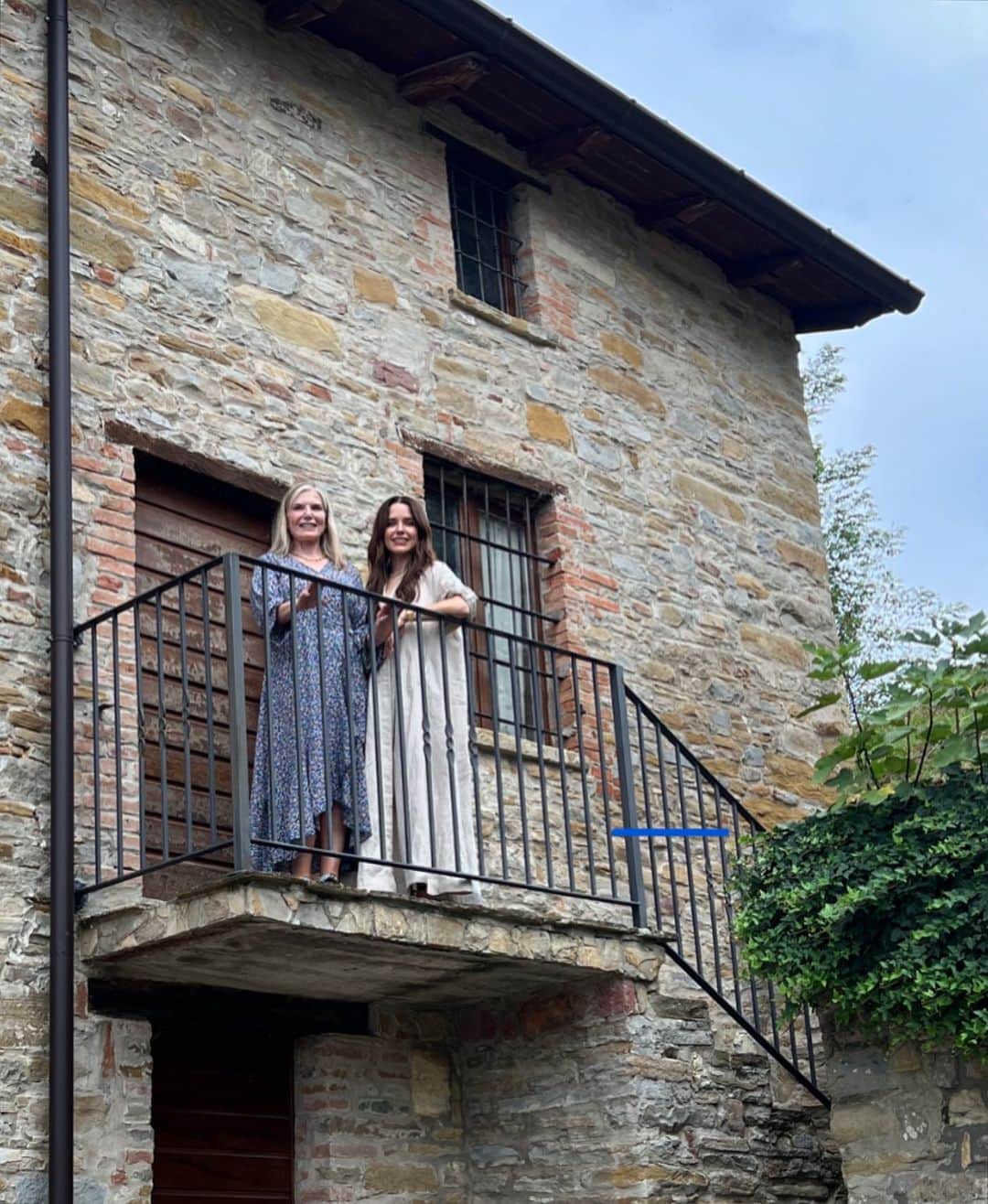 ソフィア・ブッシュのインスタグラム：「My Grandmother was born behind this door, in this little stone farm house, with no electricity or running water. She came to the United States on a boat with my great grandparents, and entered into what would become her home country through the storied lines at Ellis Island. And just two generations later, this image of my mother and I standing in her mother’s birth place was captured on the tiny computer I carry around in my pocket after my family and I took an airplane thousands of miles back to our country of origin, to stand here and visit our family that descended from our same roots. What can happen over the span of three generations takes my breath away. As does the way a place can feel like home, in your bones, the moment you return.」