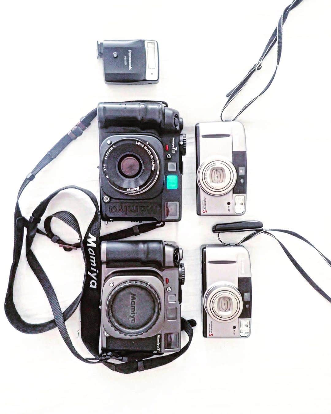 石川直樹のインスタグラム：「For Himalayas⑤ My#PhotographyEquipment  今回の遠征に持ってきた機材↓ #Mamiya7ii ×1台+80mm標準レンズ #Mamiya7 ×1台 #CanonAutoboy ×2台 Panasonicのストロボ KodakPortra400（120）×40本 KodakEktar100（120）×20本 KodakPortra &Ektar（35mm）×30本 ジッツォのカーボン三脚 オリンパスの古いコンデジ *今回はマキナ持ってこなかった。ちょい壊れやすいから。 . 3枚目はカトマンズのカメラ屋で見つけたフィルム。KodakのColorplusは感度200のはずなのに、なぜか100。しかも期限切れで、1本3800ルピー（約4200円）！値段交渉してもそこまで下がらず。高い…😅」