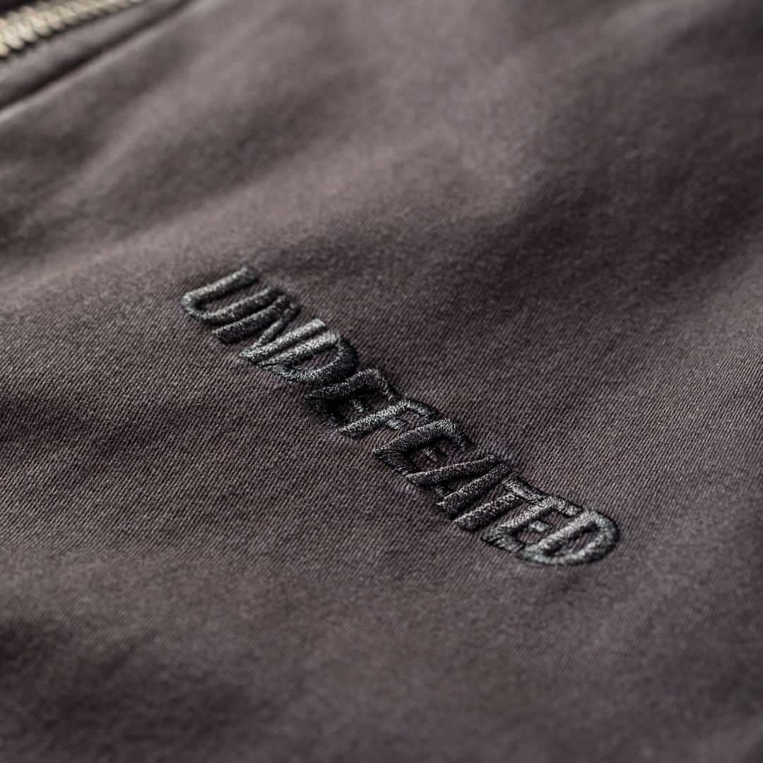 UNDFTDさんのインスタグラム写真 - (UNDFTDInstagram)「A detailed look into UNDEFEATED FALL 23 - Drop 4  Drop 4 begins with the UNDEFEATED Twill MA-1 Jacket, available in Black. The MA-1 Jacket is crafted from cotton twill and elastane with an enzyme wash, featuring a filled lightweight twill lining, interior pocket, embroidered UNDEFEATED wordmark on the left chest and a rib collar, cuff and waistband.   Available now, exclusively at all UNDEFEATED Chapter Stores and Undefeated.com」9月24日 4時00分 - undefeatedinc