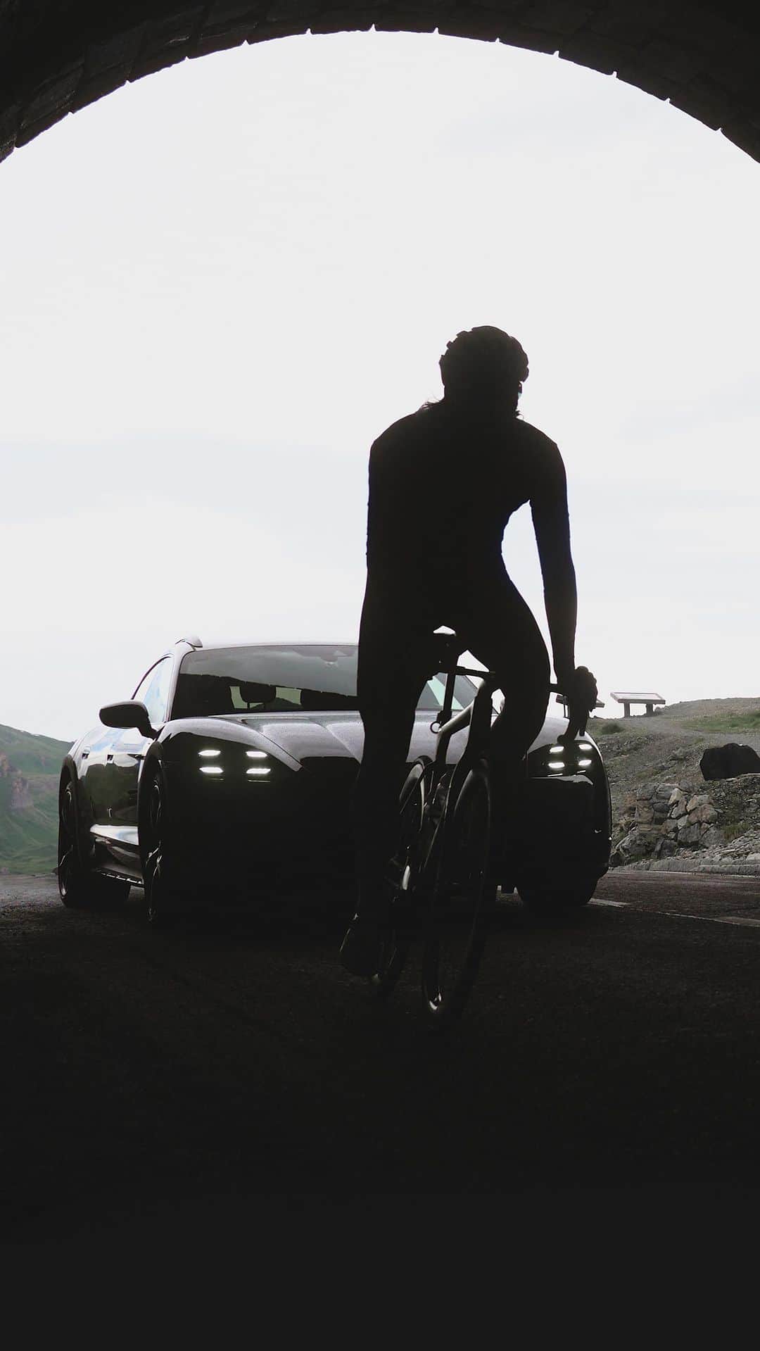 Porscheのインスタグラム：「All charged up for a race to the summit.  Discover what happened when @rickzabel climbed the Grossglockner by bicycle and Taycan. Link in bio. __ Taycan Turbo Cross Turismo: Electrical consumption combined in kWh/100 km:  24,2 - 21,3 (WLTP); Range combined in km:  423 - 483 (WLTP), Range City in km:  533 - 613 (WLTP); CO2 emissions combined in g/km: 0 (WLTP) I https://porsche.click/DAT-Leitfaden I Status: 09/2023」