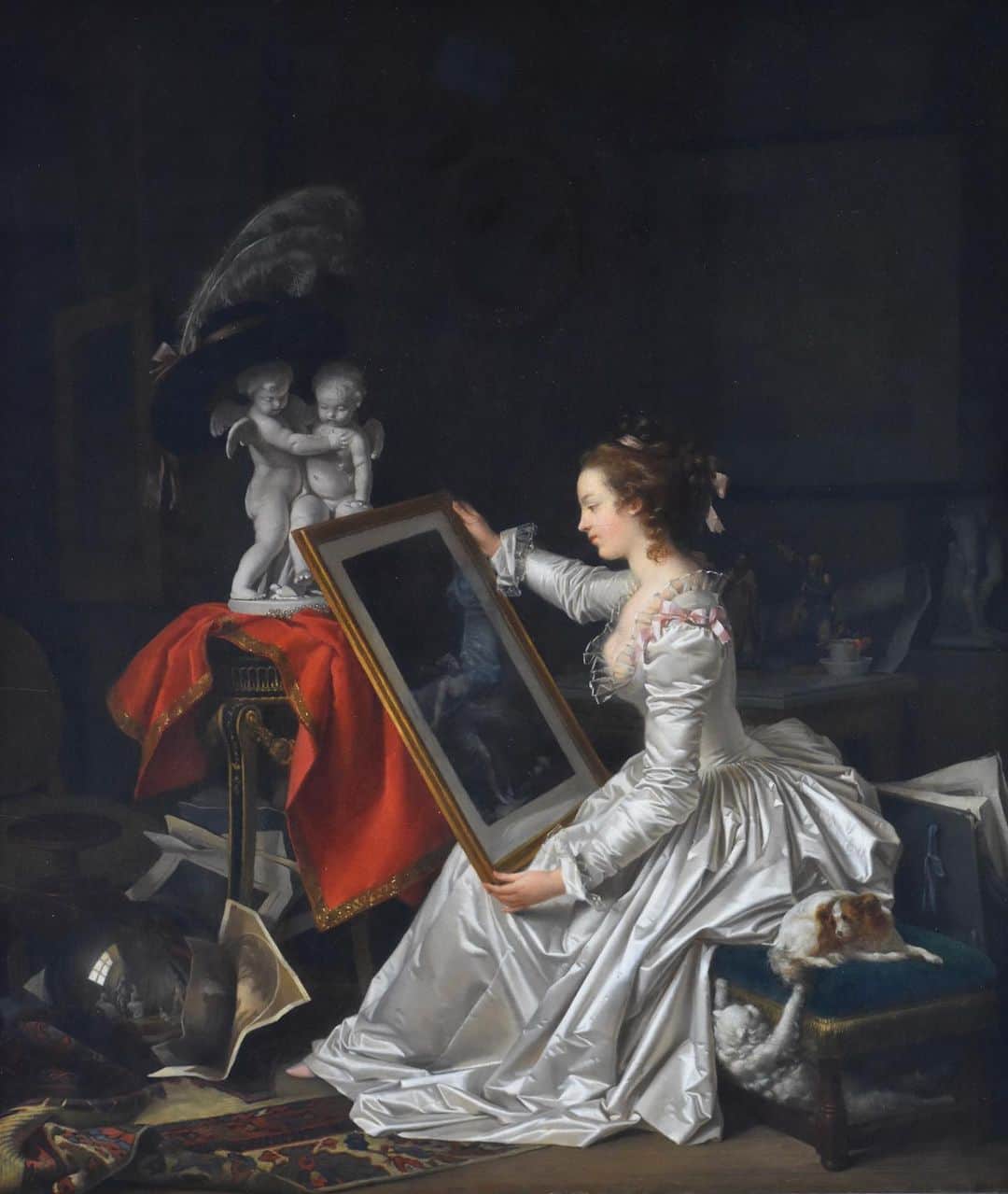 ルーブル美術館さんのインスタグラム写真 - (ルーブル美術館Instagram)「#LouvreAnecdotes 🇫🇷 Savez-vous qu’un tableau de Marguerite Gérard (1761-1837), acquis en vente publique en 2019, est exposé au 2e étage de l’aile Sully (salle 929) ?  - ✍️ Marguerite Gérard est l’une des femmes artistes les plus importantes de la fin du 18e siècle, reconnue pour ses scènes de genre et ses petits portraits, aux côtés d’Adélaïde Labille-Guiard, Anne Vallayer-Coster et Elisabeth Vigée Le Brun. - 🔎 Ce tableau est l’une des premières peintures présentées sous le seul nom de Marguerite Gérard, même s’il n’est pas impossible que Fragonard, auprès de qui elle fut élève, ait peint quelques détails comme le chat et le chien en bas à droite. L’œuvre offre d’ailleurs un hommage au peintre : la figure principale étudie une gravure d’après une composition de Fragonard, « La Fontaine d’amour » (@gettymuseum). - 👀 L’Élève intéressante offre une composition raffinée. La délicatesse du traitement des tissus, le rendu des matières, le poli des métaux et le subtil clair-obscur sont exceptionnels. ∴ 🌎 Did you know that a painting by Marguerite Gérard (1761-1837), acquired at public auction in 2019, is on display on the 2nd floor of the Sully wing (Room 929)? - ✍️ Marguerite Gérard was one of the most important female artists of the late 18th century, renowned for her genre scenes and small portraits, alongside Adélaïde Labille-Guiard, Anne Vallayer-Coster and Elisabeth Vigée Le Brun. - 🔎 This is one of the first paintings presented under the sole name of Marguerite Gérard, although it's not impossible that Fragonard, with whom she was a pupil, painted some of the details, such as the cat and dog in the lower right. The work also offers a tribute to the painter: the main figure studies an engraving based on a composition by Fragonard, "La Fontaine d'amour" (@gettymuseum). - 👀 “L’élève intéressante” offers a refined composition. The delicate treatment of the fabrics, the rendering of the materials, the polish of the metals and the subtle chiaroscuro are exceptional. - 📷 © Musée du Louvre / Nicolas Bousser  . . . #Louvre #MuséeDuLouvre」9月25日 18時42分 - museelouvre