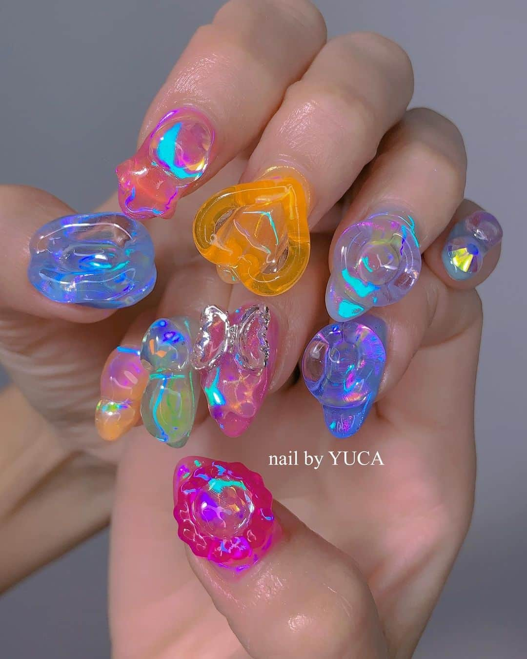 YUCAのインスタグラム：「URUURU🫧💿🦋💖 ⁡ ⁡ ⁡ #うるうるネイル #nail #ネイル #オーロラネイル #クリアネイル #clearnails #젤네일 #네일 #네일아트 #auroranails #tettynail #유카네일 #우루우루네일 #uruurunail #美甲 #yucanail」