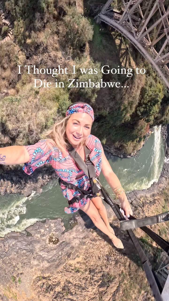 アリサ・ラモスのインスタグラム：「I 100% thought I was going to die in Zimbabwe recently! And it’s such a ridiculous story. 🤦‍♀️  Let me start it by saying that I had bungee jumped at Victoria Falls before!! …and I FORGOT that it feels like your going to die, so I went ahead and made it an activity on my #MyLifesATravelTribe group trip earlier this month.  Obvi since it’s my trip and I’m supposed to be the fearless leader, I opted to go first (well, after our two guys who were extremely eager to go). The day of I was finally like, “Wait, why am I doing this again?” 😂  I forgot how much scarier it is since you’re strapped by the ankles (others I’ve done strap at the waist harness). On top of that, they wrap towels around your ankles first so the harness is tight enough or something or maybe to avoid ripping your skin off.  So as I’m sitting there getting strapped, my first fail is trying to fix my selfie stick, and I was so nervous that I was shaking, and dropped the screw, and watched it fall down through the grate floor, thousands of feet, into the river below Victoria Falls 🤦‍♀️  That meant I couldn’t hold my camera, and not holding a camera gives me anxiety. But whatever I hopped to the edge, jumped, and enjoyed flying for 5 seconds…  Then the recoil sent me flying back into the air while spinning so fast that my vision blurred. I also had a really bad sinus cold, so the pressure in my face suddenly felt like it was going to explode.  But the worst part was hanging there upside down when it was over. Suddenly it felt like my feet were slipping out of the towels! I tried to flew them to keep them in, but I definitely looked below and thought, “Fml I’m going to fall into the river and get eaten by a crocodile”.   Turns out most of the people in my group felt the same way, and about half hated the experience as much as I did. 🤪  The end.   …so would you bungee here?  #victoriafalls #victoriafallszimbabwe #victoriafallsbungee #bungeejumping #bucketlist #mylifesatravelmovie #zimbabwe #zambia #africa #adrenalinejunkie #adrenaline」