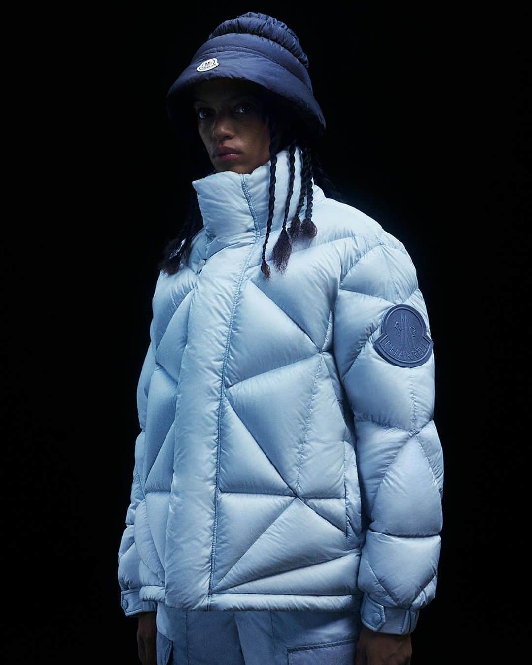 のインスタグラム：「Cold comfort for outdoor pursuits. A ribbed puffer hat and geodesic-quilted jacket boast a complete trifecta of function, form, and fantasy.  Explore Moncler x Pharrell Williams at moncler.com.   #MONCLERPHARRELLWILLIAMS #MONCLERGENIUS  @pharrell」