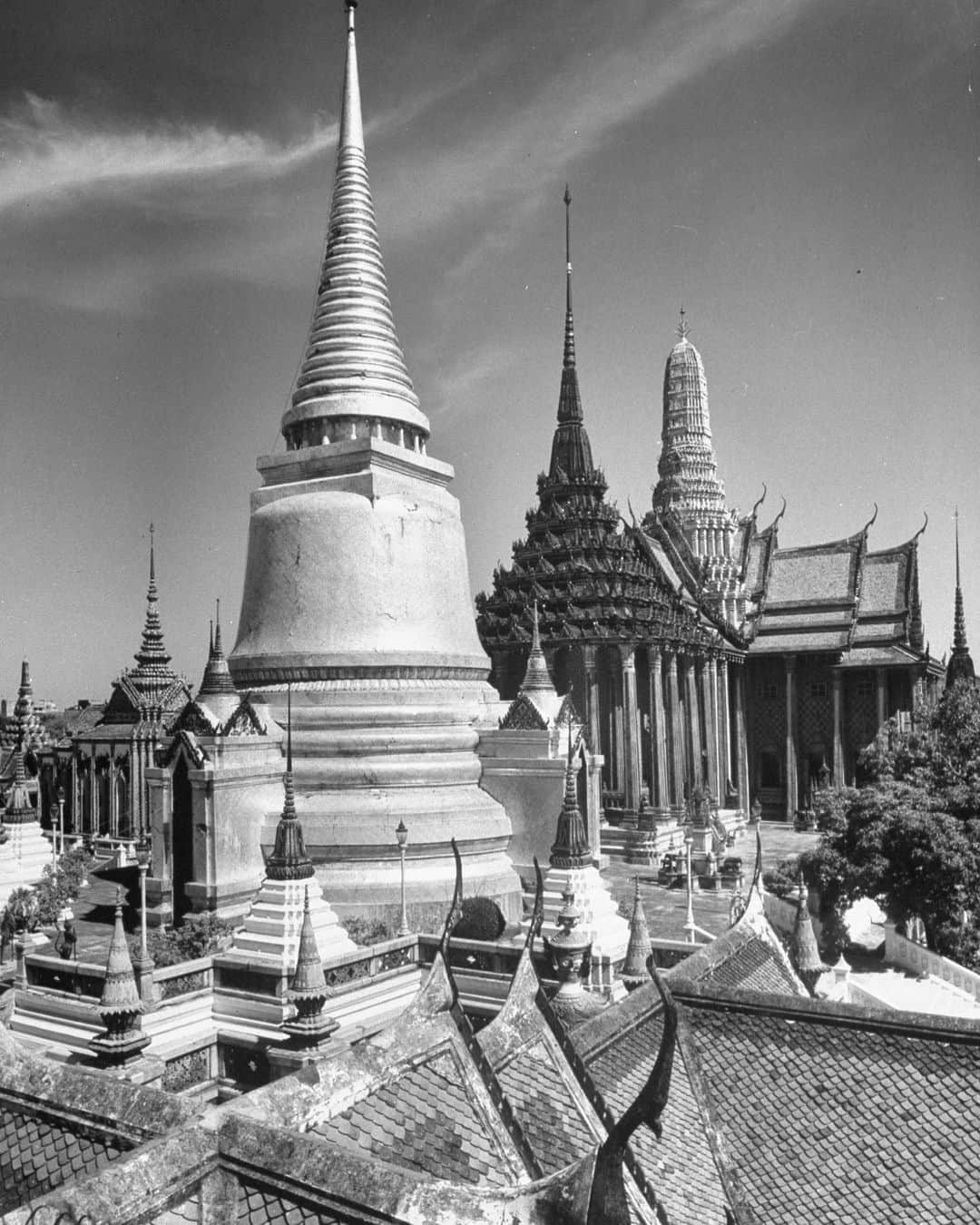 lifeのインスタグラム：「Temple of the Emerald Buddha as seen from the northern side, taken by LIFE photographer Dmitri Kessel - Thailand, 1950.   Learn more about Kessel and his photography by clicking the link in bio!  “The world held too many attractions for this endlessly curious fellow, who was capable of shooting hard-hitting, eruptive news photos but also gorgeous architectural photography.”  (📷 Dmitri Kessel/LIFE Picture Collection)   #LIFEMagazine #LIFEArchive #DmitriKessel #TravelTuesday #Temple #Buddha #Architecture」