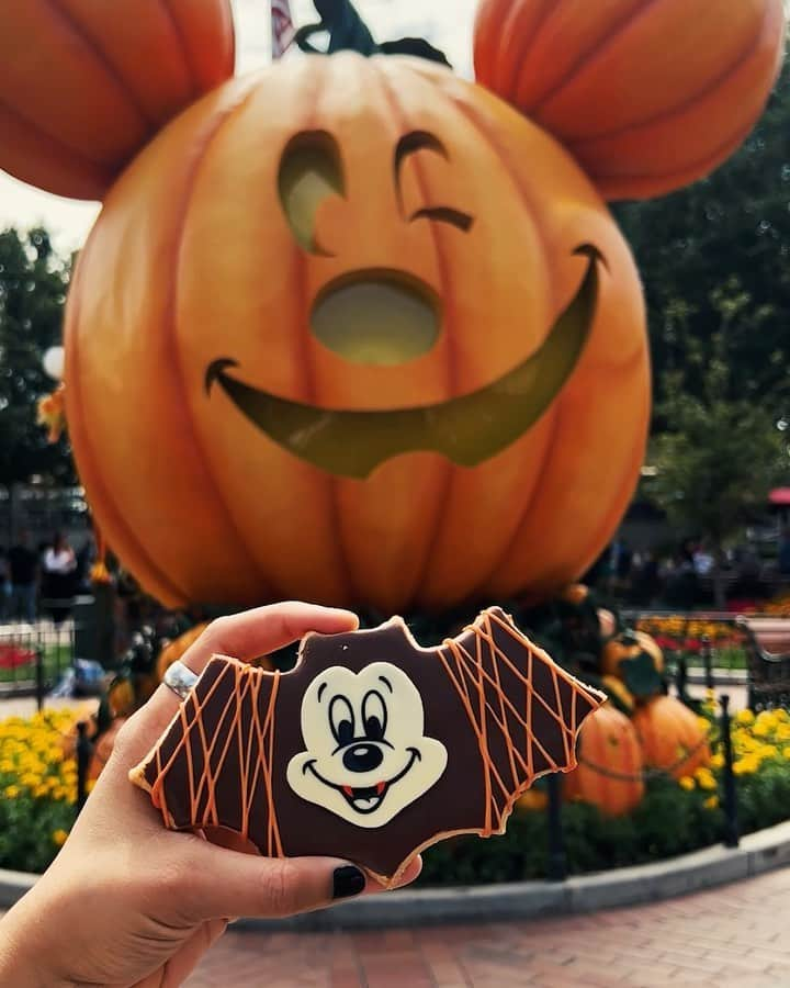 ディズニーランドのインスタグラム：「No tricks, all treats! Which #Disneyland Resort Halloween treats are you getting?   Don’t forget to keep the #Halloween vibes going by tuning into @freeform’s @31nightsofhalloween all October!  🦇 for the Mickey Bat Cookie 🌶️ for the Spicy Beef and Pepper Jack Cheese Corn Dog 🦴 for the Zero 30th Anniversary Bucket 🪦 for the Rest in Chocolate Sundae 🍏 for the Candy Apple Churro」