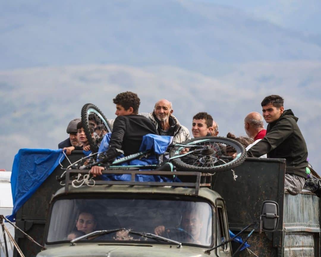 AFP通信さんのインスタグラム写真 - (AFP通信Instagram)「A continuous stream of vehicles crept along the only road out of Nagorno-Karabakh towards Armenia, carrying tens of thousands of refugees now faced with an uncertain future.⁣ ⁣ 1 & 2 - Refugees arrive at the Armenian Red Cross centre near Kornidzor.⁣ ⁣ 3 - Refugees sit in a truck after crossing the border near Kornidzor.⁣ ⁣ 4 - Refugees wait in their car to cross the border at Lachin checkpoint.⁣ ⁣ 5 - An Azerbaijan soldier control a truck at the in Lachin checkpoint, as refugees sit in the dump truck to leave Karabakh for Armenia.⁣ ⁣ 6 - Refugees stand next to their car and their belongings in a street of Goris.⁣ ⁣ 7 & 8 - Refugees wait near a Red Cross registration centre in Goris.⁣ ⁣ 9 - Refugees leave the Red Cross registration center in Goris to Yerevan.⁣ ⁣ 📷 Alain Jocard⁣ 📷 @emmanuel.dunand⁣ #AFP」9月27日 20時01分 - afpphoto