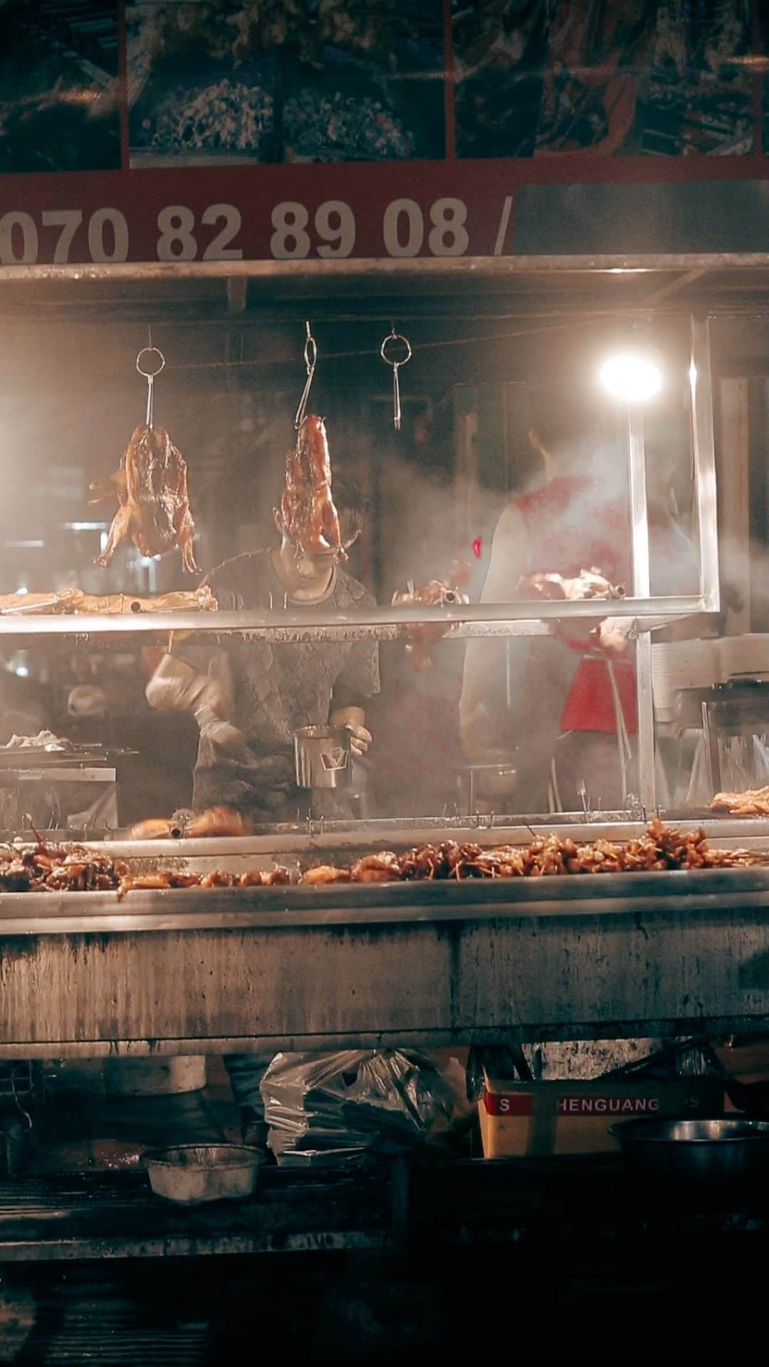 Shunsuke Miyatakeのインスタグラム：「Smoky Yakitori Vendor / Phnom Penh, Cambodia  There's a bunch of street vendors around TTP Market at night. This Yakitori vendor attracts a lot of customers every night with good smell with dense smoke. From a boy on errands to family on night out, different customers que up for their Yakitori. Sharing Yakitori and eating with family is one of an iconic food culture here in Cambodia.」