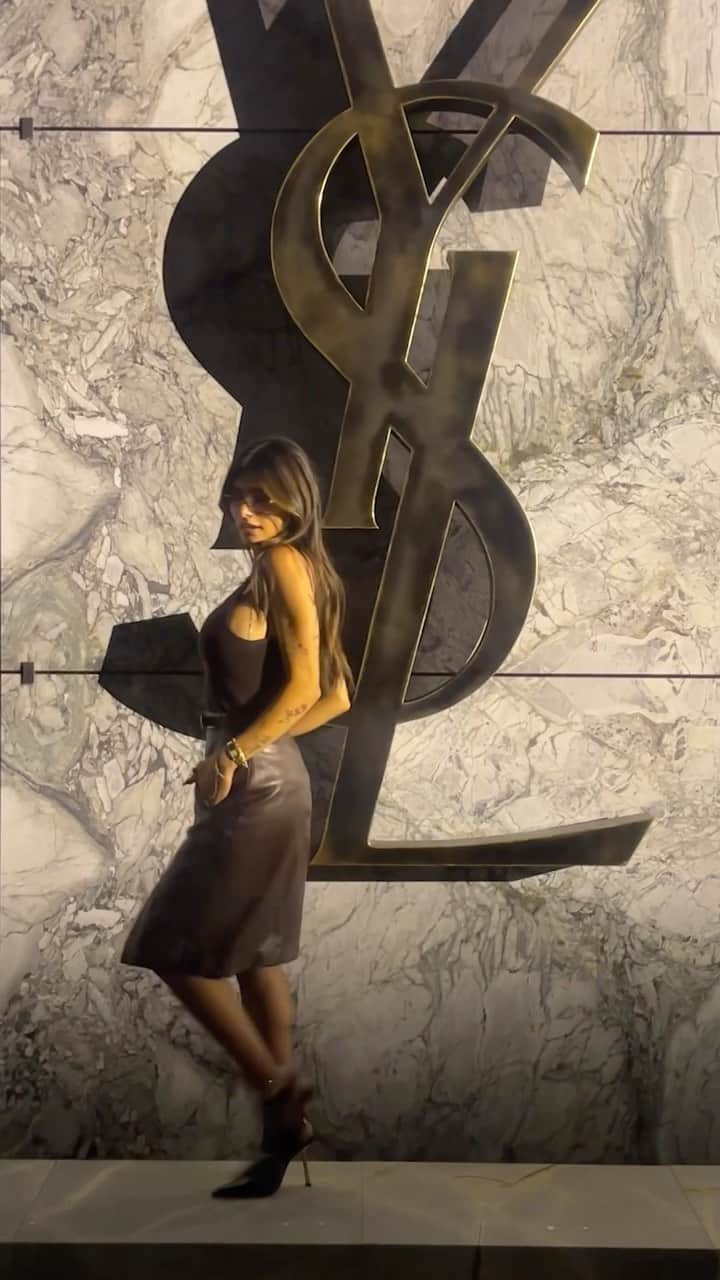 のインスタグラム：「@miakhalifa takes us with her to the @ysl SS24 show ❤️‍🔥   Stay tuned to #DazedFashionTV for all your fashion week updates 📺✨  #DazedFashion #SaintLaurent #SS24 #YSL #PFW #ParisFashionWeek」