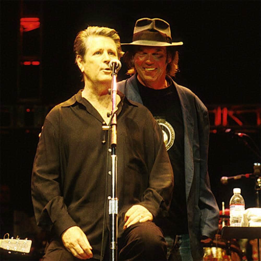 ブライアン・ウィルソンのインスタグラム：「2004: Brian and band performed at Neil Young’s annual Bridge School Benefit. Said Brian: “I always liked Neil – talk about pleasant.”   Sang Neil on “Long May You Run”:  “Maybe The Beach Boys have got you now With those waves singing, ‘Caroline, No’ Rollin' down that empty ocean road Gettin' to the surf on time”  #2004 @neilyoungarchives @thebeachboys #carolinenow #oceanroad #surfontime #longmayyourun」