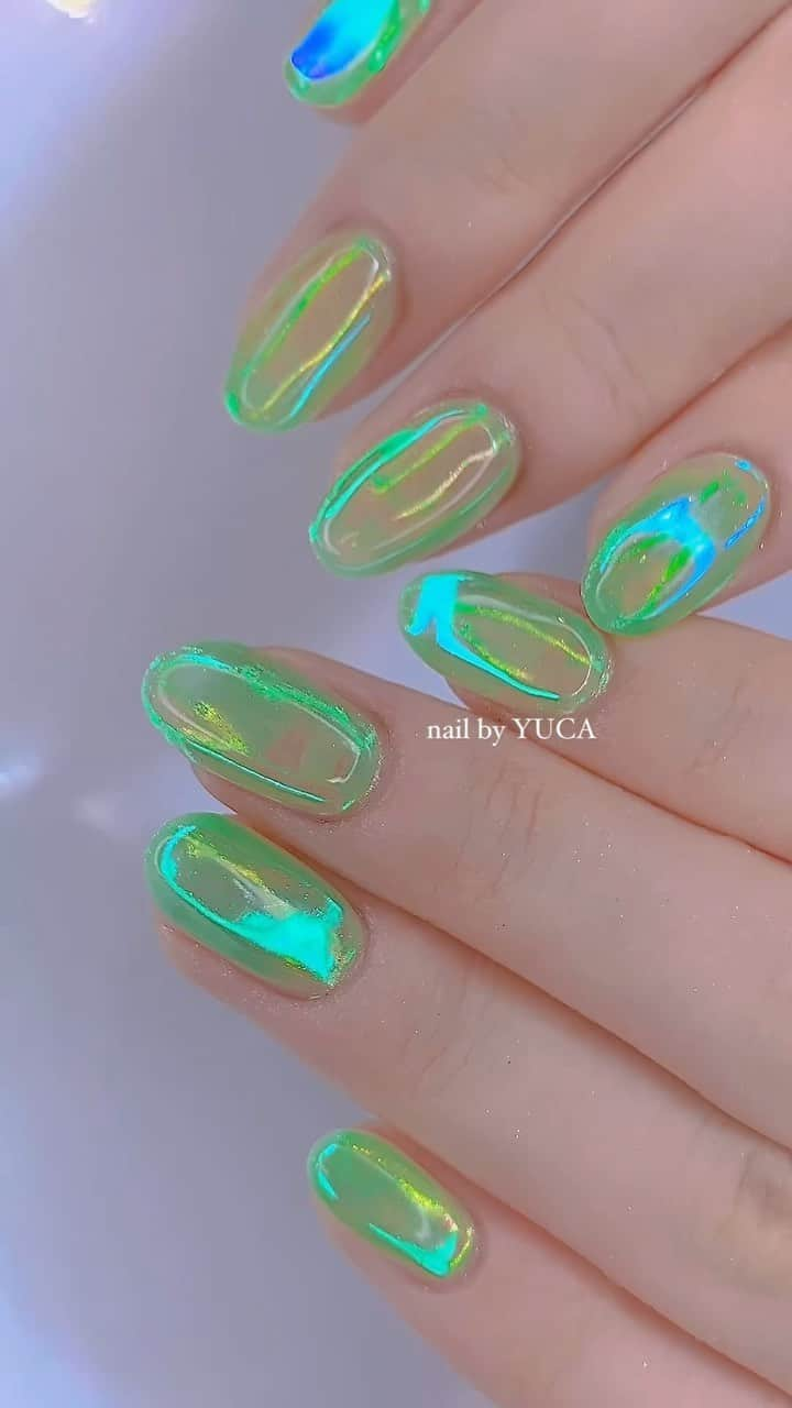 YUCAのインスタグラム：「nct color💚 ⁡ ⁡ ⁡ #うるうるネイル #nct #nail #ネイル #オーロラネイル #クリアネイル #clearnails #젤네일 #네일 #네일아트 #auroranails #tettynail #유카네일 #우루우루네일 #uruurunail #美甲 #yucanail」