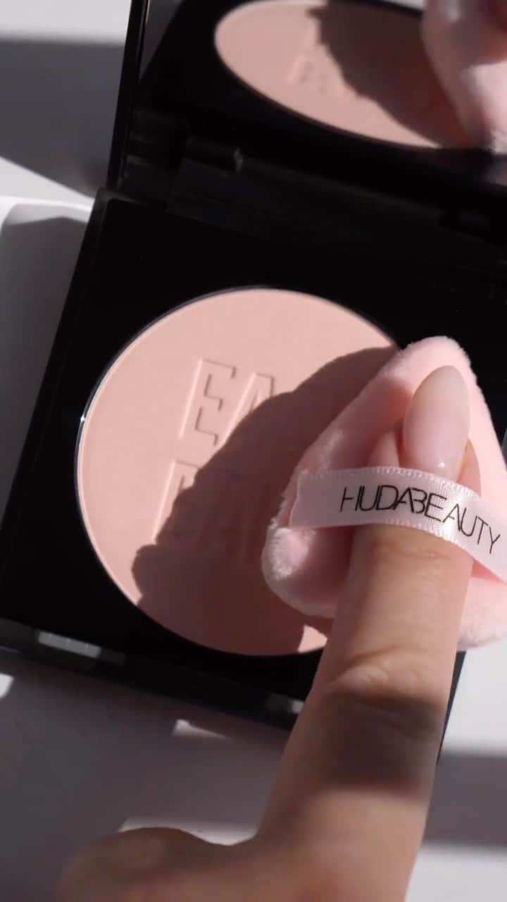 Huda Kattanのインスタグラム：「@makeup2themaxx swatches our NEW Easy Bake And Snatch Pressed Powder!   ✨ Cherry Blossom Cake: Fair to Medium skin tones with pink undertones ✨ Cupcake: Fair to Light skin tones with pink undertones ✨ Pound Cake: Fair to Light-Medium skin tones with neutral undertones ✨ Banana Bread: Medium to Deep Tan skin tones with golden undertones ✨ Blondie: Medium to Deep Tan skin tones with golden undertones ✨ Kunafa: Deep Tan to Rich skin tones with gold golden undertones ✨ Cinnamon Bun: Deep to Rich skin tones with neutral undertones ✨ Coffee Cake: Deep to Rich skin tones with red undertones  Which one will you be adding to your beauty collection? ✨💄」