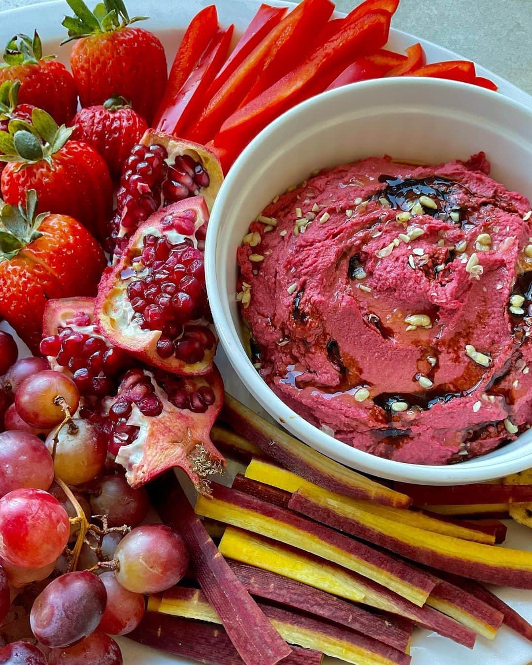 Vitamix Global Headquarters Real foodさんのインスタグラム写真 - (Vitamix Global Headquarters Real foodInstagram)「This beet hummus radiates the perfect after school snack for the fall time - thanks @sarahlee.chowing for this beautifully delicious recipe!   Full recipe: To Dip: - Gochujang tortilla quesadillas - Quinoa crackers - Red grapes - Strawberries - Bell peppers - Pomegranate - Purple carrots  Beet powder hummus: - 1 can chickpeas, drained and rinsed - 3 Tbsp EVOO - 2 Tbsp lemon juice - 2 tsp minced garlic - 2 tsp beetroot powder - 1 tsp cumin - 1/4 cup tahini - 1/2 tsp sea salt - 4 large ice cubes  #vitamix #myvitamix #fallrecipe #UGC」9月30日 0時05分 - vitamix