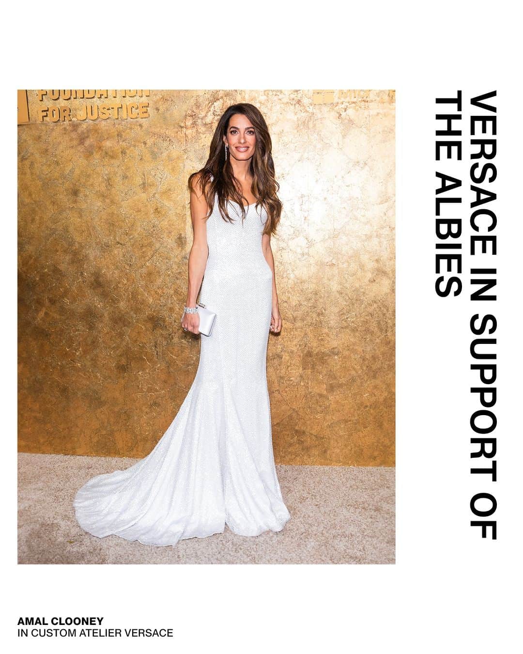 ジャンニヴェルサーチのインスタグラム：「Versace in Support of The Albies  Following the Versace Foundation’s multi-year partnership with the Clooney Foundation for Justice, The Albies sees prominent figures from the worlds of human rights, business, entertainment, fashion, and technology come together to show their support to this year’s honorees, individuals who work towards seeking justice at all costs.  Hosted at the New York Public Library, the following celebrities wore Versace to attend:  Amal Clooney wore a pure white silk satin gown that hugs the figure before flaring at the hem. A white crystal net construction is layered over the design. The design took over 450 hours to complete. - Cindy Crawford wore a silk satin georgette gown with signature Atelier Versace bustier construction featuring heritage lace intarsia and signature safety pins. Satin straps form a Versace 'V' at the front and back of the design. The design took over 500 hours to complete. - Viola Davis wore a column dress crafted in silk chiffon georgette with chiffon side panel draping and features an off-shoulder neckline of twisted silk chiffon that falls into a rear train. The design took over 400 hours to complete. - Julianne Moore wore an archival column dress from the Atelier Versace 1994 collection. The design is crafted in wool crepé and features metal Medusa shoulder strap details. - Bart Freundlich wore a custom shawl collar tuxedo with single-breasted tailored jacket, matching pants and over a white shirt and tie. - Emma Wall wore a silk cady gown with lace embroidery and semi-transparent tulle sleeves from the Resort 2024 collection. - Jeremy Strong wore a velvet croc-effect devoré single-breasted tailored jacket from the Fall-Winter 2023 collection. The suit was complete by tailored pants. - Alicia Keys wore a silk-satin black gown with a signature Atelier Versace bustier construction. The long-length gown features a thigh-high side slit and is layered with a removable draped crystal net skirt. The design took over 400 hours to complete.  #TheAlbies  #AtelierVersace  #VersaceFW23」
