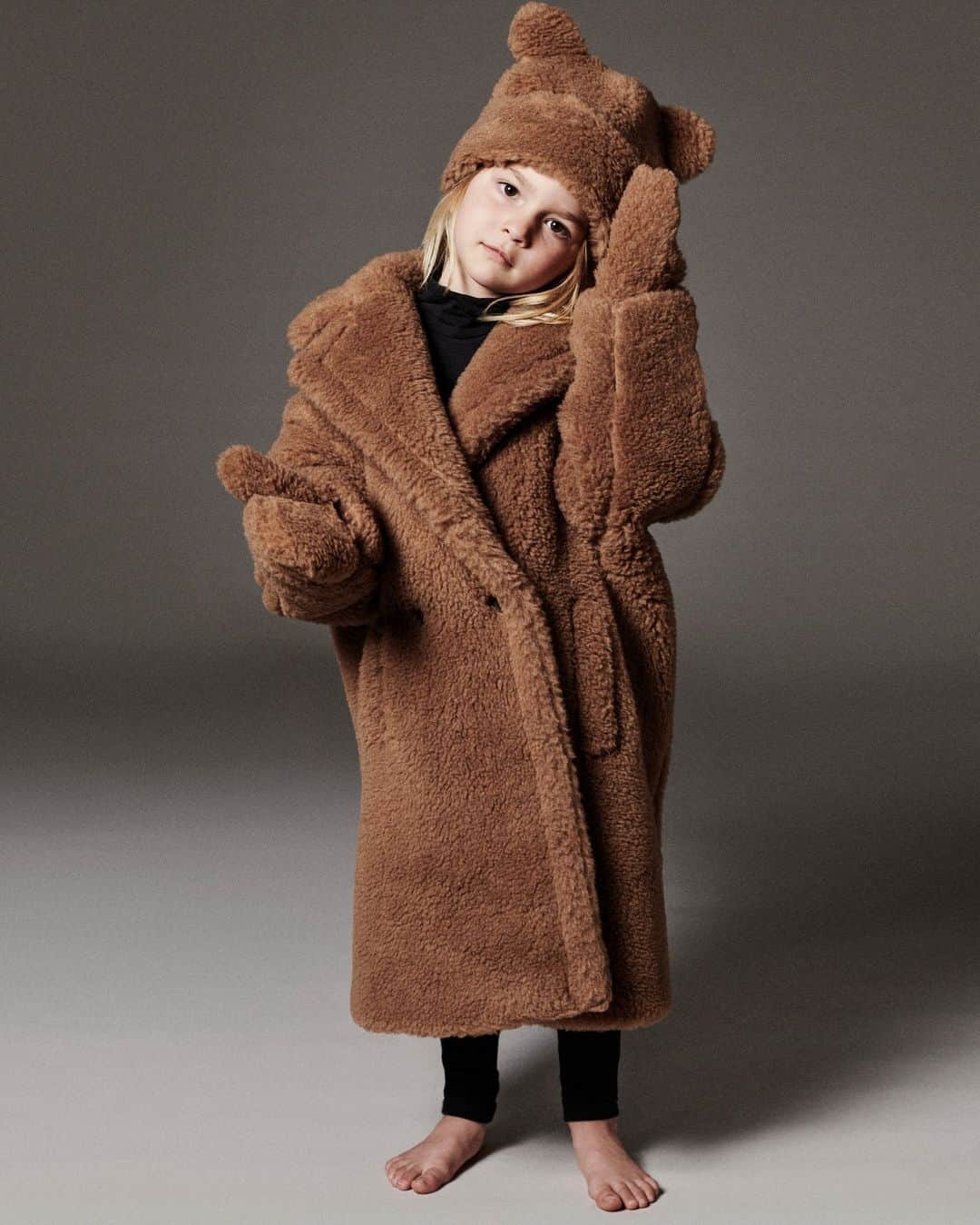 マックスマーラのインスタグラム：「Teddy Ten: a story of an icon. The #MaxMaraTeddyBear coat is turning ten this year. To celebrate the cozy, enveloping silhouette, a limited edition collection for children age 5-12 will be available starting October 4th in select flagships or at maxmara.com. #MaxMaraTeddyTen #MaxMara」