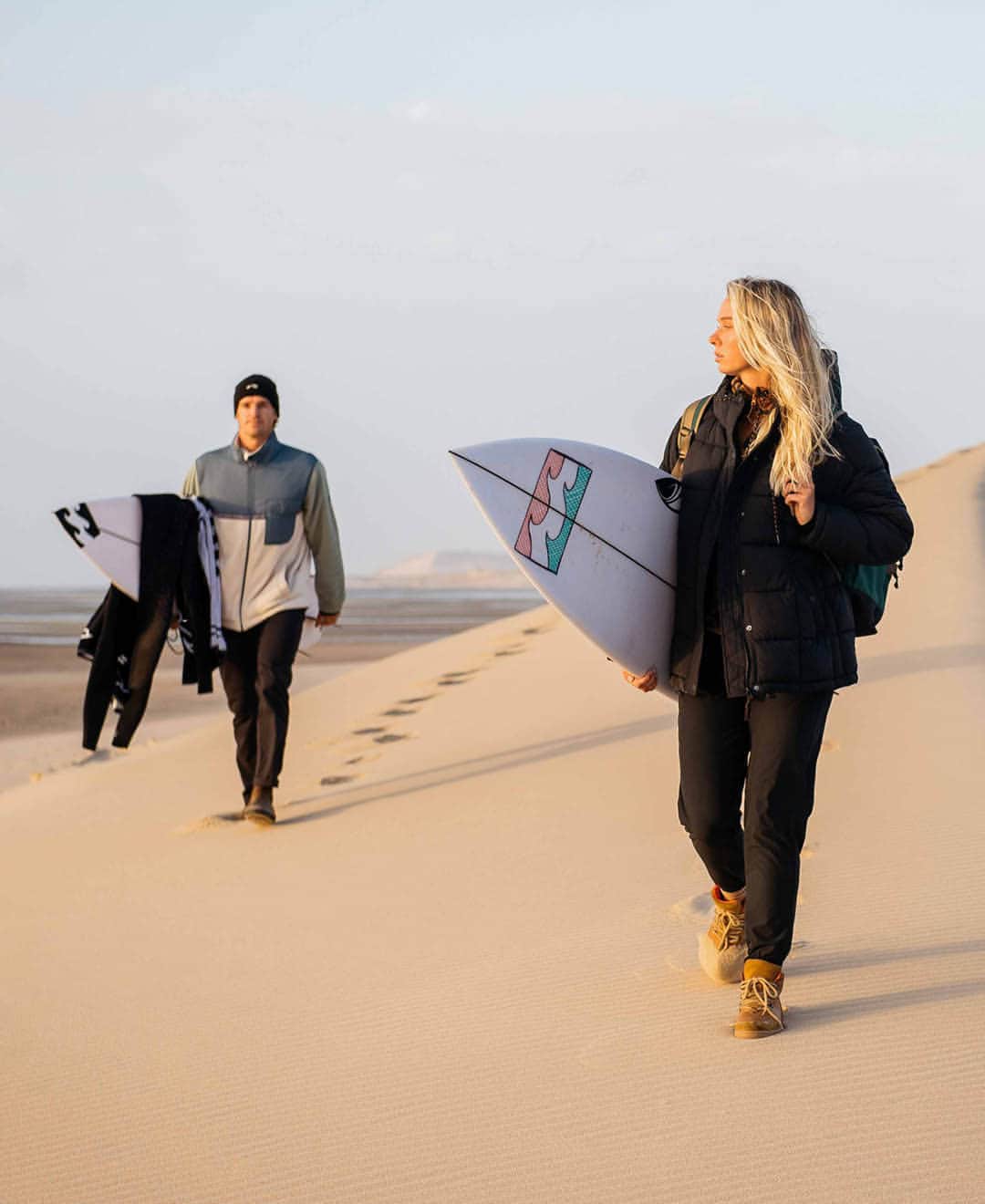 BILLABONG WOMENSさんのインスタグラム写真 - (BILLABONG WOMENSInstagram)「After a long day out on the water surfing the break in front of our cabins, we decided to head to the dunes. We packed a cooler and hit the road aiming to get there around sunset, about an hour drive away. It took a bit of off roading to get there, boards and camera gear flying as we ripped through the sand and rocky terrain with the windows down and music blasting. We pulled up to the dunes overlooking the ocean right at golden hour and watched the sun set over the Atlantic. Perfect end to the day. Watch the film, link in bio. #BillabongAdventureDivison」9月30日 1時00分 - billabongwomens