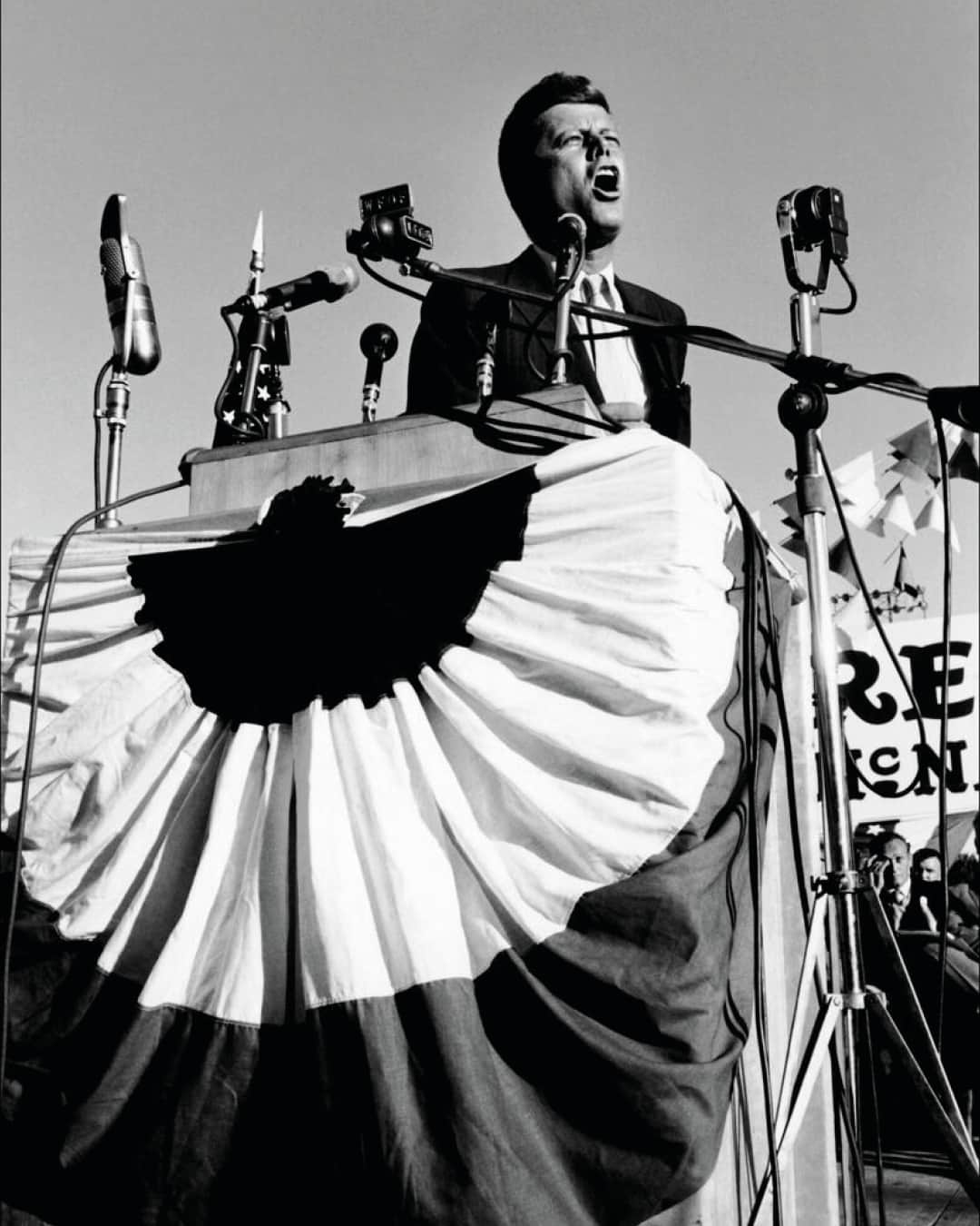 Magnum Photosのインスタグラム：「Speak your truth 🗣️⁠ ⁠ Photography has played a pivotal role in consigning public speeches to historical fame, with many such moments immortalized through the lenses of Magnum photographers. ⁠ ⁠ John F. Kennedy was photographed by Cornell Capa throughout his 1960 campaign trail, documenting the moments of spoken intensity that would help yield his presidential victory less than a year later.⁠ ⁠ In 1961, @evearnoldphotographer created a historic visual document of Malcolm X: "As we worked together, the passionate orator who could whip a crowd to euphoria... began to unbend and to think of situations for me to photograph."⁠ ⁠ @ianberrymagnum photographed Margaret Thatcher in 1979 delivering a speech while wielding two bags of groceries, attempting to illustrate the effects of inflation in support of her campaign pledge.⁠ ⁠ PHOTOS (left to right):⁠ ⁠ (1) John F. Kennedy along the whistle-stop campaign tour that took him to 25 towns in 5 days all over the US. USA. 1960. © Cornell Capa © @icp / Magnum Photos ⁠ ⁠ (2) Leon Trotsky lecturing. Copenhagen, Denmark. 1932. © Robert Capa © @icp / Magnum Photos⁠ ⁠ (3) Fidel Castro delivering an hours-long speech. Santa Clara. Cuba. © @burtglinnphoto / Magnum Photos⁠ ⁠ (4) Frances "Sissy" Farenthold for Vice President rally. Gloria Steinem at the podium. USA. 1972. © @leonardfreed / Magnum Photos⁠ ⁠ (5) Trump speaks to the RNC. Cleveland. Ohio. USA. 2016. © @susanmeiselas / Magnum Photos⁠ ⁠ (6) Benazir Bhutto, co-Chairperson of the PPP (Pakistan People's Party) campaigns in the most populated province of Pakistan. Punjab Province. Pakistan. 1993. © @abbas.photos / Magnum Photos⁠ ⁠ (7) A Black Panther leader is addressing high school students in a church. Chicago. Illinois. 1969. USA. © Hiroji Kubota / Magnum Photos⁠ ⁠ (8) Mr Winston Churchill. Blackpool. Lancashire. England. 1954. © Marc Riboud / Fonds Marc Riboud au MNAAG / Magnum Photos⁠ ⁠ (9) Malcolm X at a Black Muslim rally. Washington D.C. USA. 1961. © @evearnoldphotographer / Magnum Photos⁠ ⁠ (10) Margaret Thatcher in 1979 before her first election victory. UK. 1979. © @ianberrymagnum / Magnum Photos」