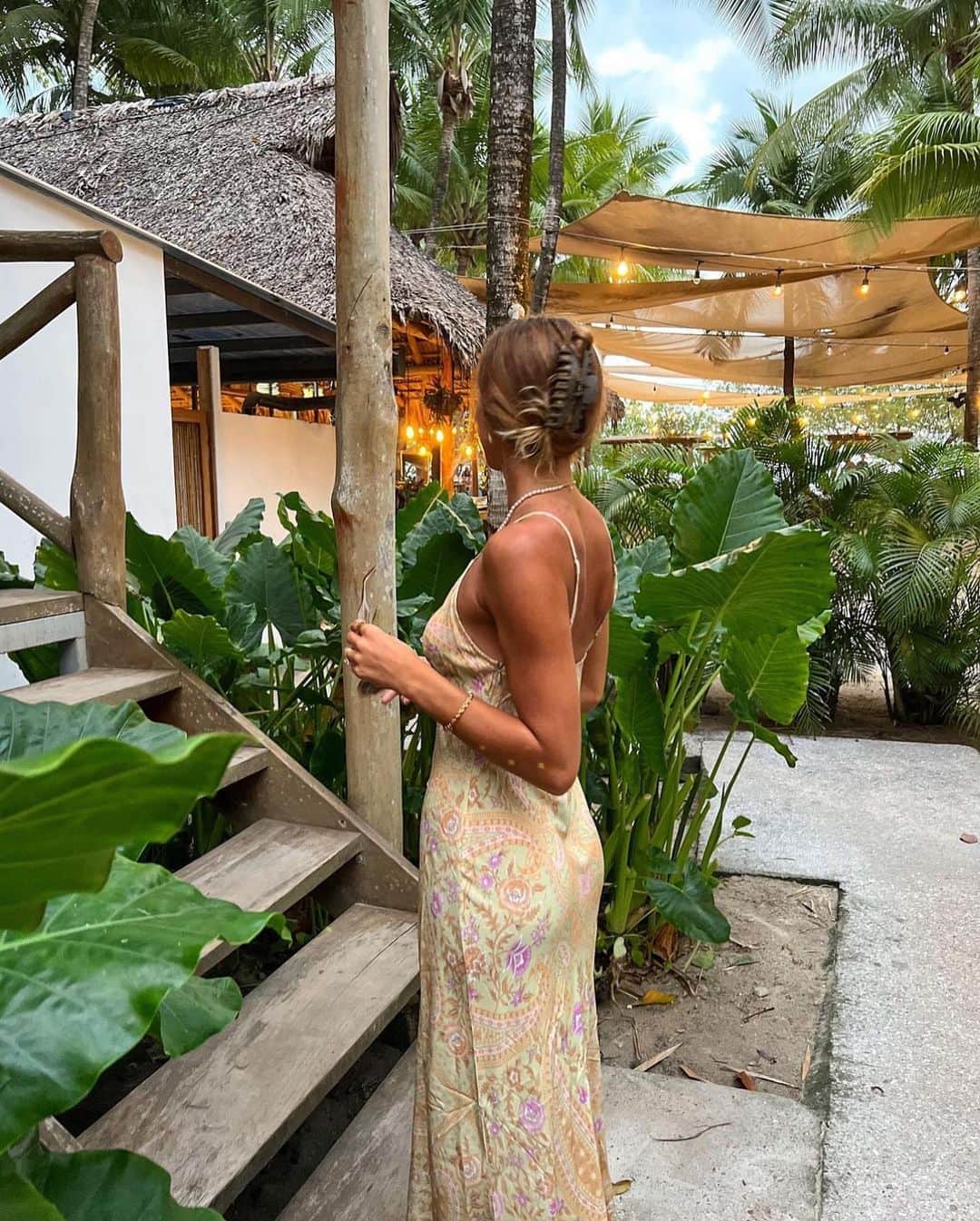 SPELLさんのインスタグラム写真 - (SPELLInstagram)「Cocktail hour with @marymargaretboud in our Belladonna Bias Strappy ~ crafted for the tropics 🌴」9月30日 9時58分 - spell