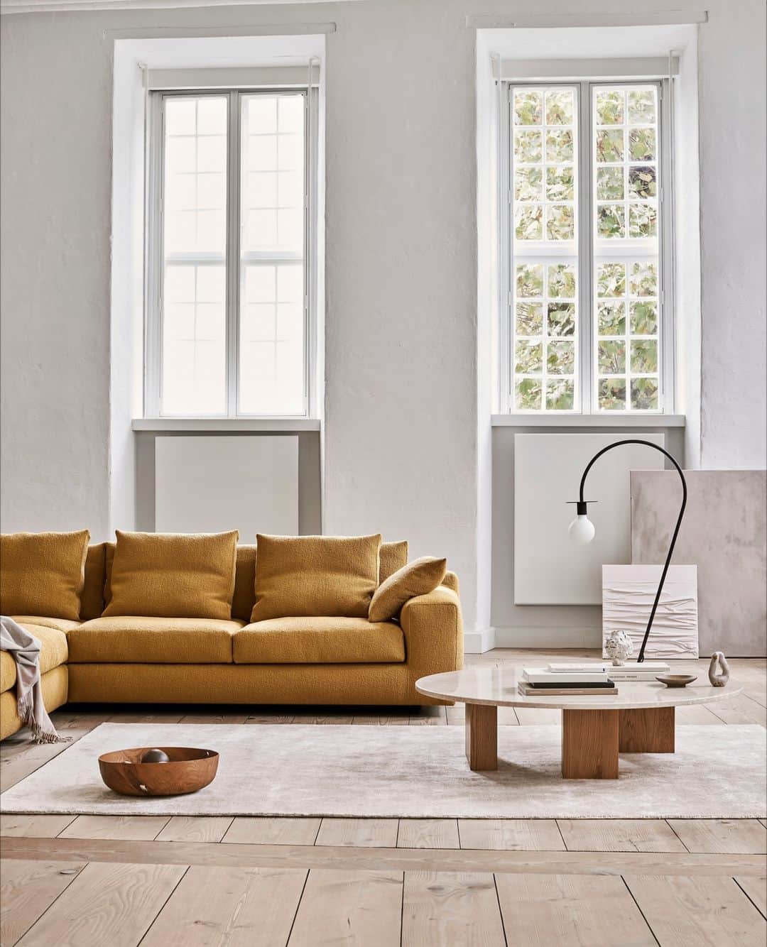 eilersenのインスタグラム：「Aton is a modern sofa that stands out with its soft, ample form. The sofa clearly carries Eilersen’s DNA in its well-proportioned design that combines a sense of spaciousness with the option of scaling the sofa to match many different types of rooms and homes.⁠ ⁠ Aton has a unique aura – just like the Egyptian sun god that the sofa is named after. And the comfort is nothing short of divine.⁠ ⁠ The sofa was designed by Jens Juul Eilersen who aimed for a soft, rounded sofa with a modern, classic feel.⁠ ⁠ ⁠ ⁠ Sofa: Aton upholstered in Wave 38⁠ Table: Puzz⁠ Carpet: Stick by Eilersen in colour Sand⁠ ⁠ ⁠ ⁠ ⁠ #eilersen #eilersenfurniture #myeilersen #enjoyaneilersen #Aton #jensjuuleilersen #homedecor #sofa #danishdesign #inredning #finahem #interiorlovers #interiordesign #modernliving #minimalism #nordiskehjem #nordicinspiration #nordicliving #craftsmanship #boligindretning #designinterior #livingroominspo #boliginspiration  #hemindredning #schönerwohnen #nordicminimalism #designinspiration #throughgenerations」