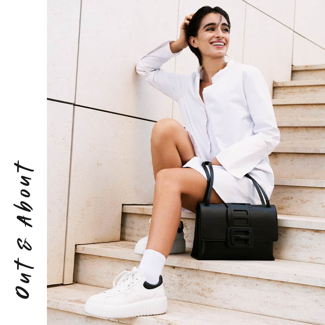 ホーガンのインスタグラム：「Create a lasting impression like @michela.derossi in the #HOGAN H-Stripes #sneakers and HOGAN H-Bag⁣ #GenH ⁣ Discover more via link in bio」