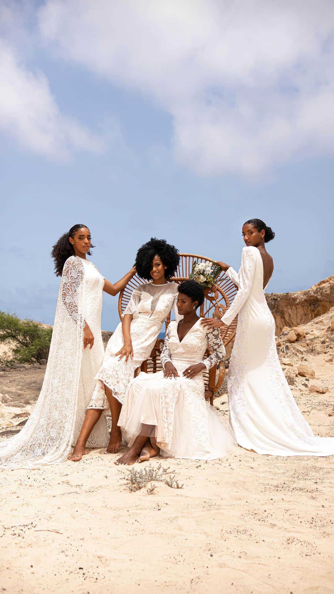 タダシショージのインスタグラム：「Lost in love, found in Cabo Verde. 💍 Embracing the beauty of romance amidst the coastal breeze and golden dunes of Sao Vicente #Africa #bridalcampaign  Created & directed by @miranda_acts Video @_matrix____ Edited @marco_rendall Production Supervisor @modesto_network  Photography @deboramelicio  Photography assistant @_alphaboy  Hair @v_a_n_n_y_13  Makeup @__leo.oliveira__  Wardrobe assistant @dulcywinchester  Models @Ilseblackfit @dory.tavares @Josy_berdianah @Rayana_fortes @nani_delgado88 Casting @heliomodel238  @mansamarinahotel @mansafloatinghub   #bridalgowns #bridalbliss #weddingseason2024 #bridaldestination」