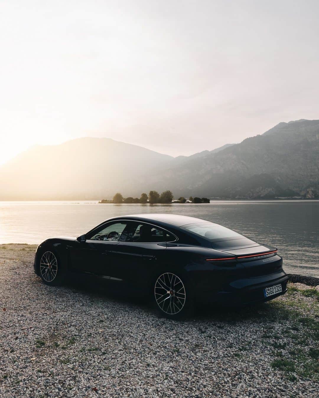 Porscheのインスタグラム：「Can you bottle a feeling? 📸 @marcusvaleur #PorscheMoment  __ Taycan Turbo: Electrical consumption combined in kWh/100 km:  23,6 - 20,2 (WLTP); Range combined in km:  435 - 506 (WLTP), Range City in km:  537 - 627 (WLTP); CO2 emissions combined in g/km: 0 (WLTP) I https://porsche.click/DAT-Leitfaden I Status: 10/2023」