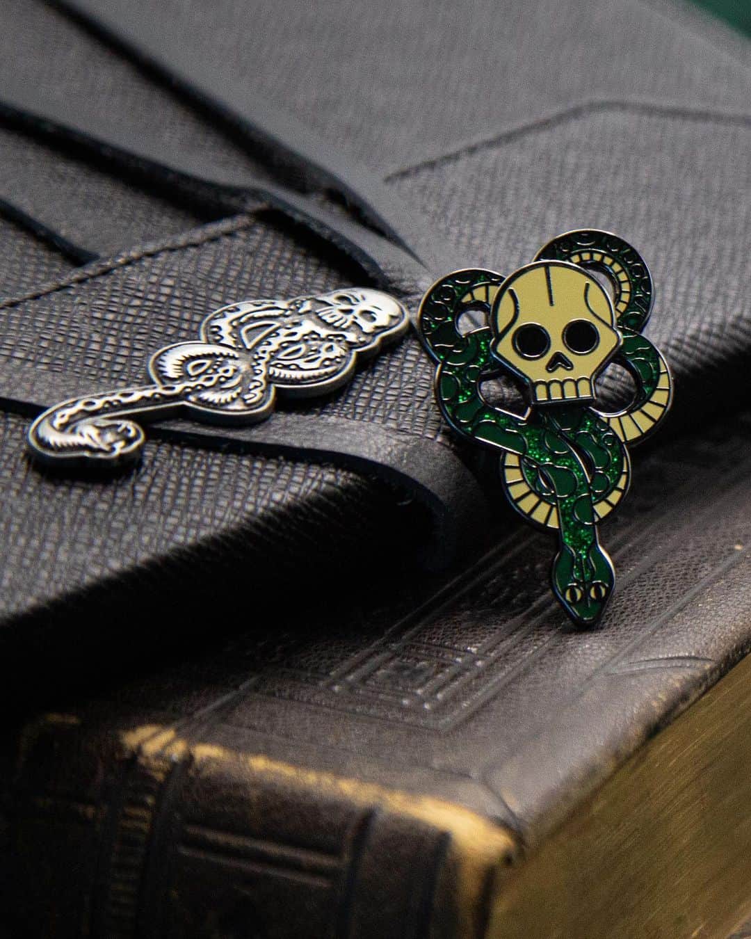 ハリー・ポッターのインスタグラム：「An accessory fit for the scariest time of year 🐍 Get your hands on your very own Dark Mark pin on the Harry Potter Shop!」