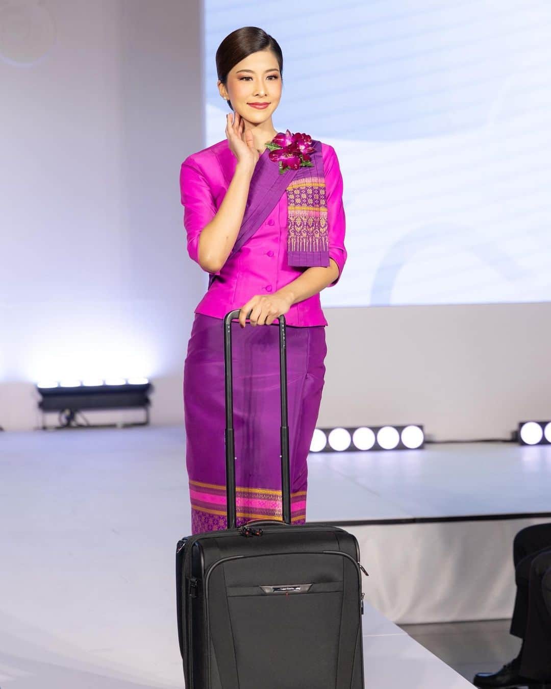 タイ航空のインスタグラム：「🌟 Introducing THAI's sustainable chic! 🌿✨ Our new Thai Ruean Ton uniform, woven with recycled materials and Thai silk, embodies grace and eco-conscious style. Get ready to see our flight attendants soar in this stunning attire from 1st January 2024! ✈️   #THAIAirways #thairueanton #sustainableelegance #uniform #cabincrew #thaicabincrew #sustainable #thai」