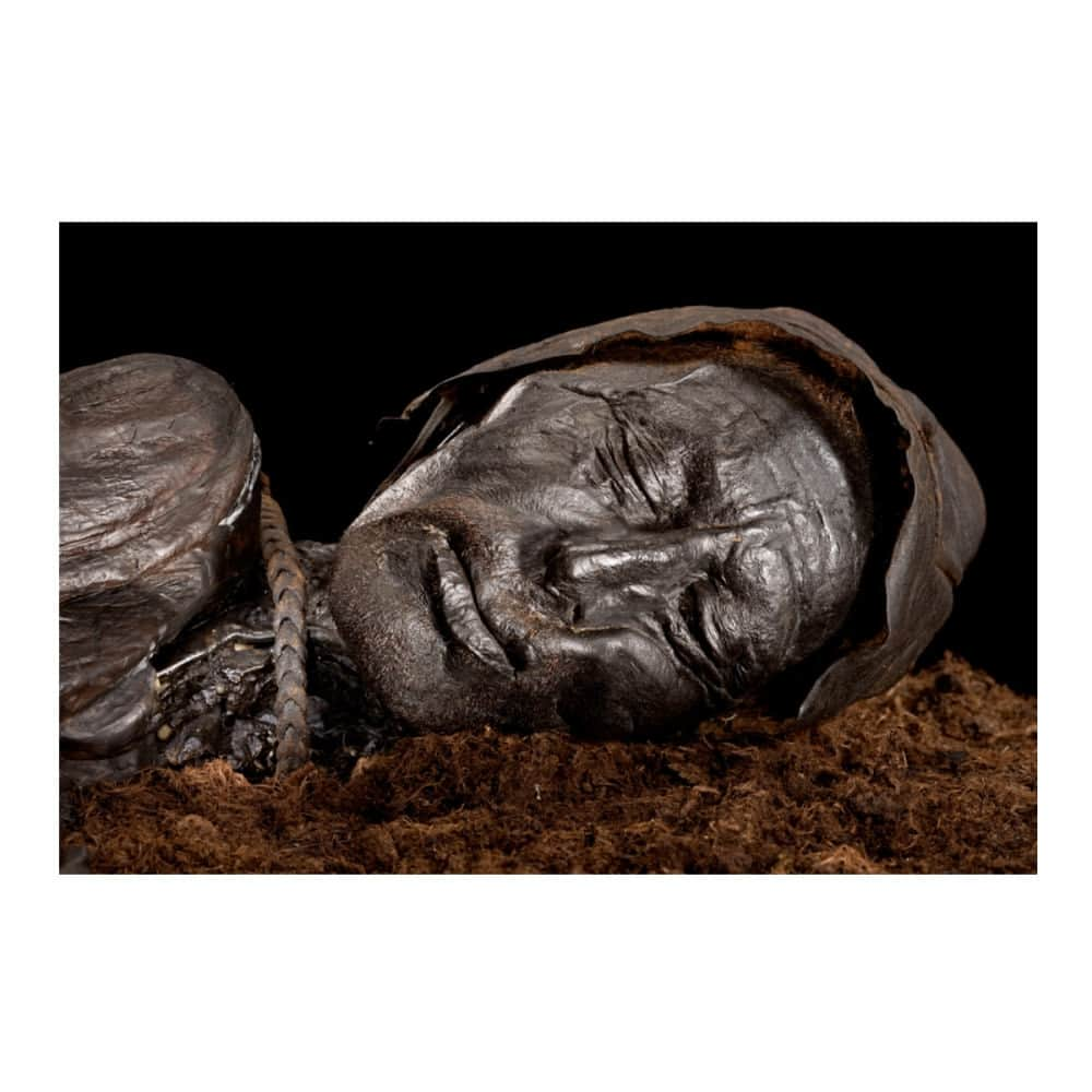 Robert Clarkさんのインスタグラム写真 - (Robert ClarkInstagram)「The Tollund Man (died 405–384 BC) is a naturally mummified corpse of a man who lived during the 5th century BC, during the period characterised in Scandinavia as the Pre-Roman Iron Age. He was found in 1950, preserved as a bog body, near Silkeborg on the Jutland peninsula in Denmark. The man's physical features were so well preserved that he was mistaken for a recent murder victim. Twelve years before his discovery, another bog body, Elling Woman, was found in the same bog Close up of Tollund Man's face.   Available! Link in bio.    #europe #figures #old #history #historic #mouth #teeth #aged #death #bone #profile #dead #ireland #science #relic #bodies #civilization #remains #nationalgeographic #mortality #preserved #mummy #anchient #bogbody #radiocarbondating #mortal #robertclark #robertclarkphoto」10月27日 4時59分 - robertclarkphoto