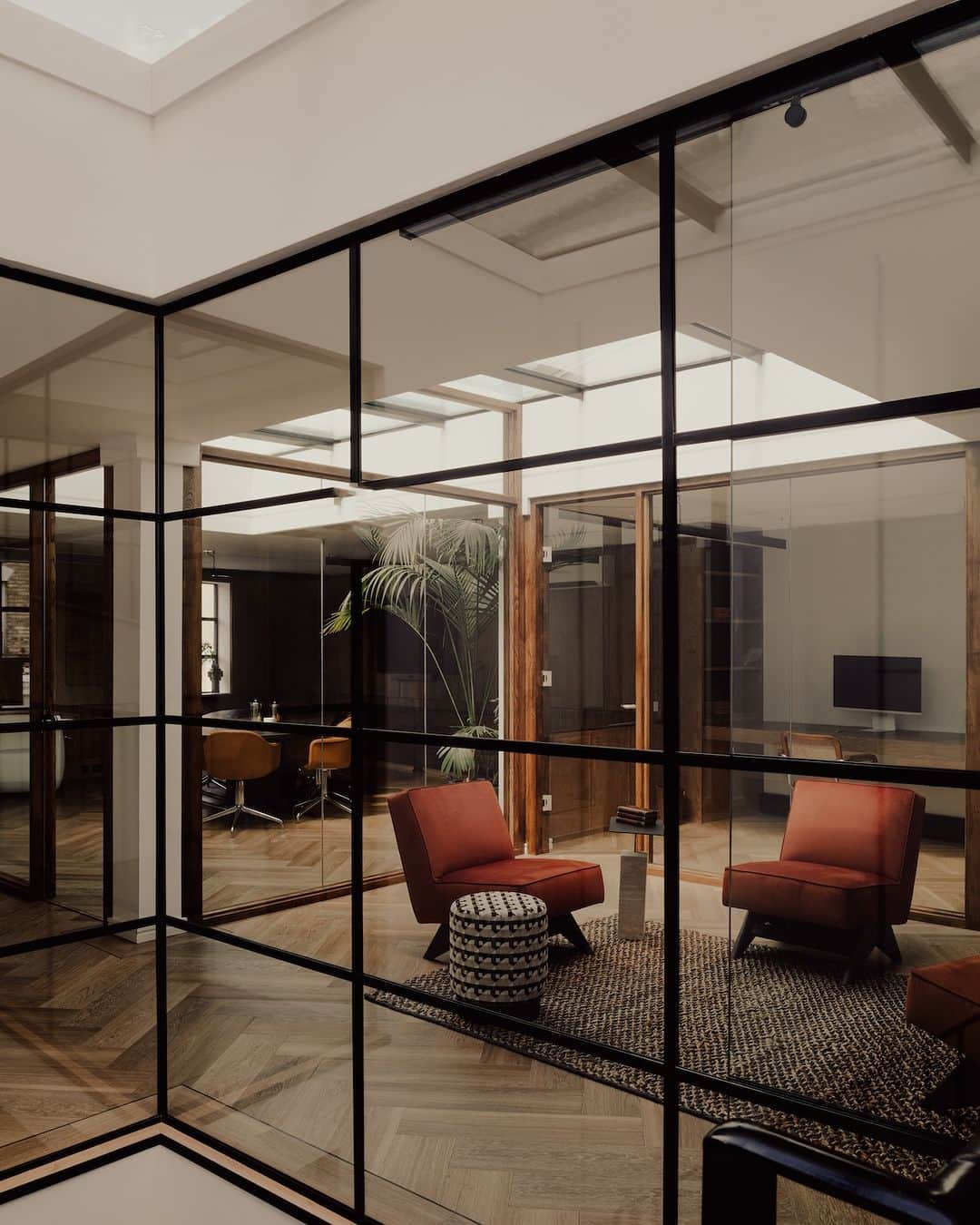 Design Milkのインスタグラム：「Office dreams... are made of this 💭  Perhaps one of the most un-office-like offices we’ve seen yet, Giant Ventures’ new workspace feels elevated yet relaxed, thanks to @miminat, founder of @miminat_designs. With abundant natural light from the glass ceilings, warm tones, + pops of color dispersed throughout, this former pottery studio is now the coziest corporate haven! \\\ Explore it more at the link in bio. 🔗  📸 Photography by @alixelay.」