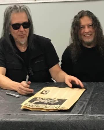 Queensrycheのインスタグラム：「Whip and Eddie signing a Queensrÿche newsletter 39 years after the FIRST TIME they both signed it - at the @bmieventcenter in Ohio!! (photo by Randy Pinney) #queensryche #eddiejackson #edbass #onetake #badassbassist #michaelwilton #whip #hellboy #guitarist #guitarplayer #newsletter #bestfans  #39yearsago⌛️」