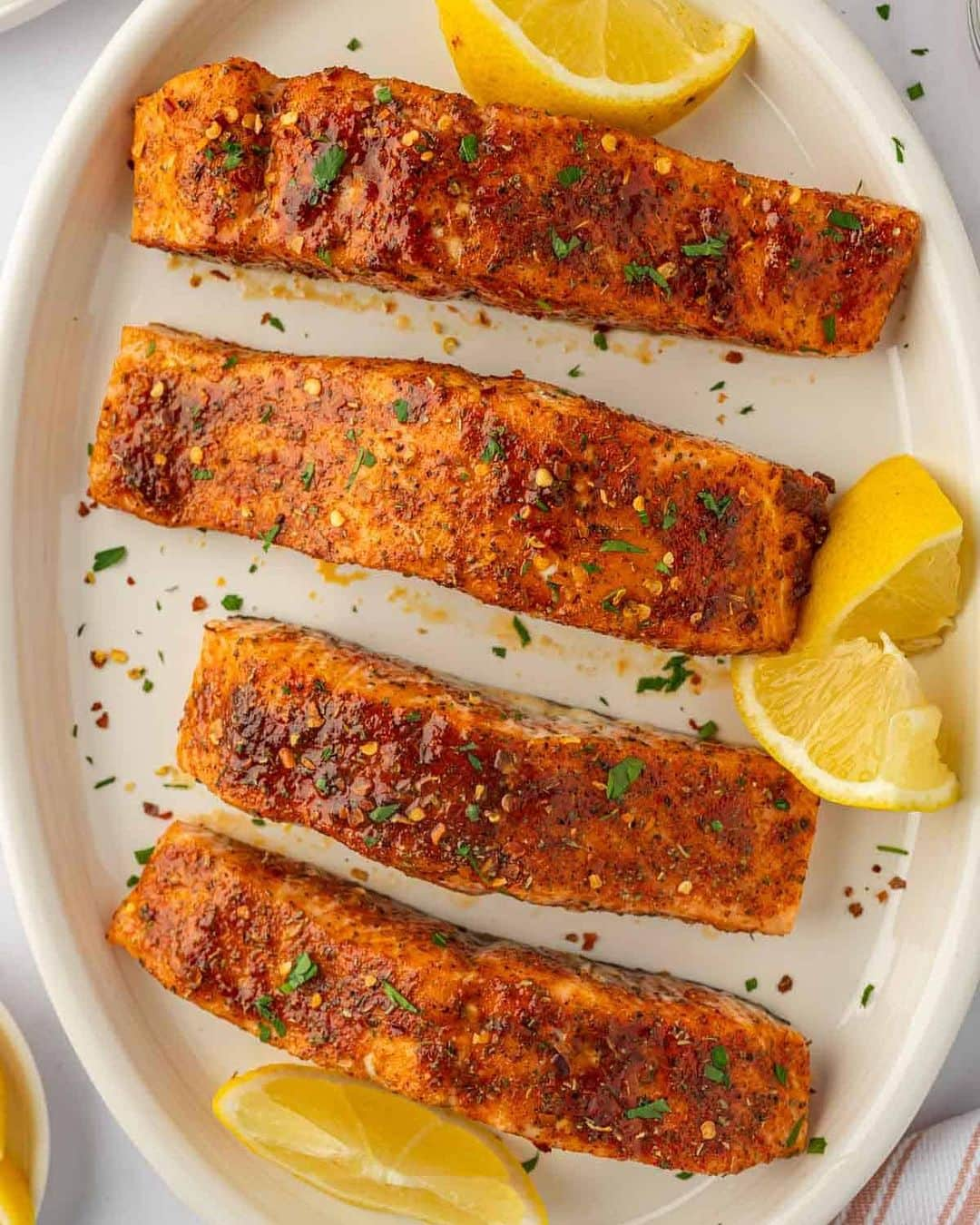 Easy Recipesのインスタグラム：「This Easy Baked Salmon recipe is savory and simple. It’s fresh and flavorful so everyone likes it. Serve with some fried rice, salad or sautéed vegetables and your meal is complete.  Full recipe link in my bio @cookinwithmima  https://www.cookinwithmima.com/brown-sugar-baked-salmon/」