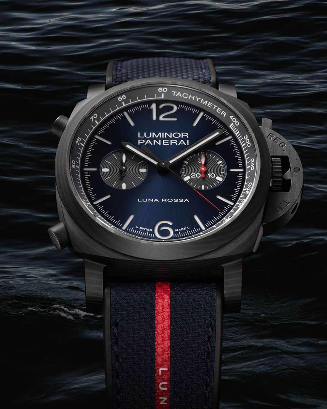 オフィチーネ パネライのインスタグラム：「Introducing the new Luminor Chrono Carbotech™️ Luna Rossa Experience #PAM1519.  Set in a 44mm Carbotech case with a blue sun-brushed dial, the watch will season over time according to wear, creating a specific look to the wearer’s surroundings.  #Panerai #PaneraiExperience #LunaRossa #AmericasCup #LunaRossaPradaPirelli」