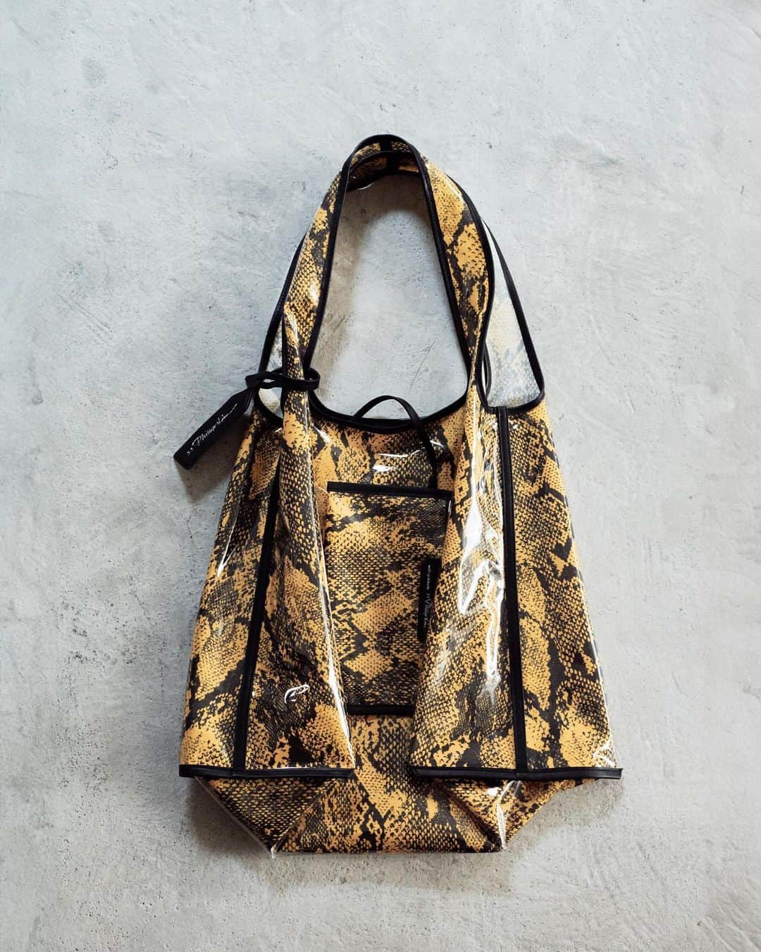 3.1フィリップリムのインスタグラム：「A NEW YORK CITY VIBRATION CHAPTER II FALL/WINTER 2023   PYTHON PRINT MARKET TOTE」