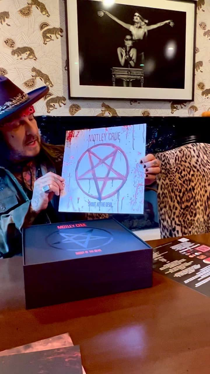 ニッキー・シックスのインスタグラム：「IT’S HERE! 🔥🔥 Celebrate 40 years of Mötley Crüe’s genre-defining album SHOUT AT THE DEVIL 🤘  Newly-remastered 40th Anniversary Limited Edition Super Deluxe Box Set featuring 7 rare demo tracks; reproductions of the original 7” singles “Too Young To Fall In Love” & “Looks That Kill”; a Pentagram Séance Board, Devil Board w/ Metal Planchette; Metal 7” Adapter; Lithographs; Tarot Cards; Devil Candle Holder & more! 🔥  Also available as Digital Deluxe and Limited-Edition physical configurations: Picture Disc, LP Replica CD, Lenticular CD & more. 📀📀  ORDER NOW: 🔗 motley.com 🔗」