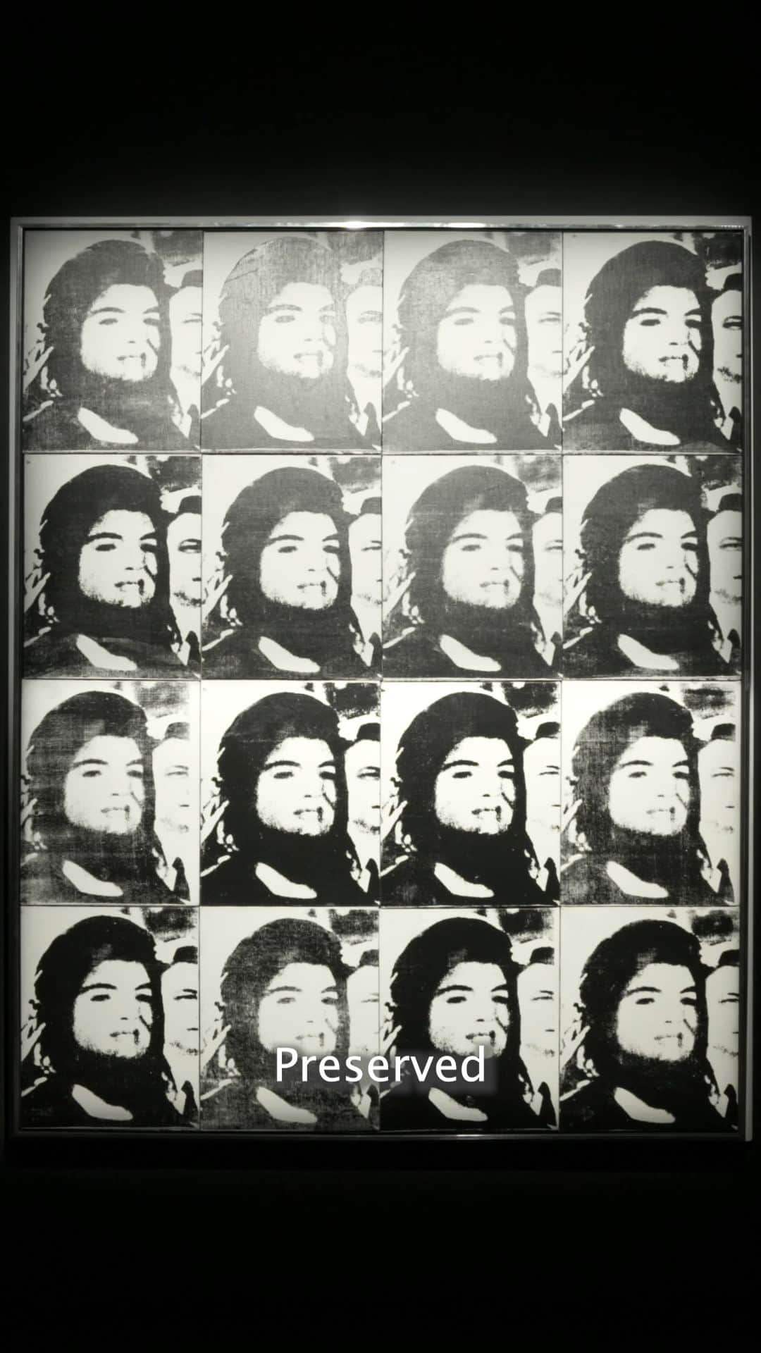 クリスティーズのインスタグラム：「Andy Warhol’s ‘Sixteen Jackies’   The assassination of President John F. Kennedy 60 years ago shocked all corners of the world and continues to haunt the American psyche today. As the world began to process the overwhelming loss, the public face of mourning was Jackie Kennedy, the grieving widow who emerged as a symbol of strength and humanity. In the aftermath, Andy Warhol, within the context of his seminal ‘Death and Disaster’ series, began to sift through the flood of images in newspapers and magazines, selecting this powerful press image taken during JFK’s funeral procession, concentrating intently on Jackie’s stoic facial expression beneath the dark organdie veil.    Part of an elite group of paintings composed of 16 canvases that were assembled in this arrangement by Warhol himself, this extremely rare example is the only composition in this format executed in a single color palette, recalling both the black-and-white colorway of newsprint and slides from a projector.  By isolating her image, then further abstracting it through the silkscreen process and repeating it, Warhol not only tells the story of one of the darkest days in modern American history, but also examines the power of images in modern society, in a classically Warholian way.  Browse this work and explore the entire auction online now, on view tomorrow at our Rockefeller Center galleries!  20th Century Evening Sale | New York | 9 November」