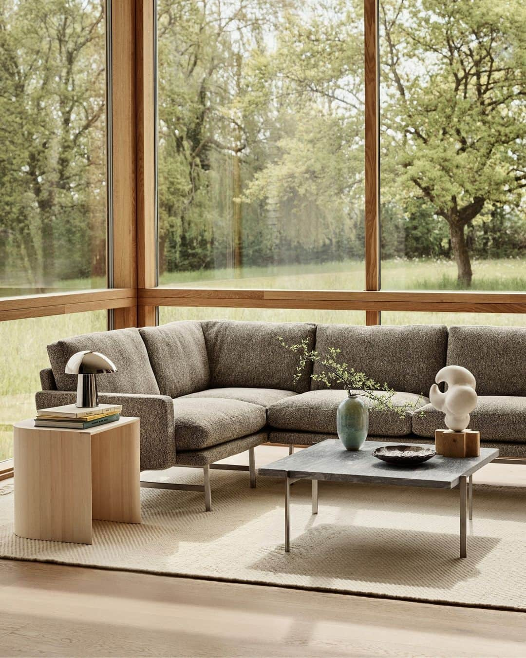 フリッツハンセンのインスタグラム：「LIVING ROOM INSPIRATION⁠ ⁠ Elegant by design: Living rooms are special places where families and guests gather to relax and socialise.⁠ ⁠ The inviting and elegant Lissoni™ sofa series now includes a new corner module, pouf and lounge chair options – perfect for spending cosy time with friends and family.⁠ ⁠ So whether you’re looking to create the perfect reading nook, or want to lounge in iconic Danish design; with the right combination of function and comfort, Fritz Hansen can help ensure your living room is beautiful from every angle. ⁠ ⁠ Explore living room inspiration via the link in bio. ⁠」