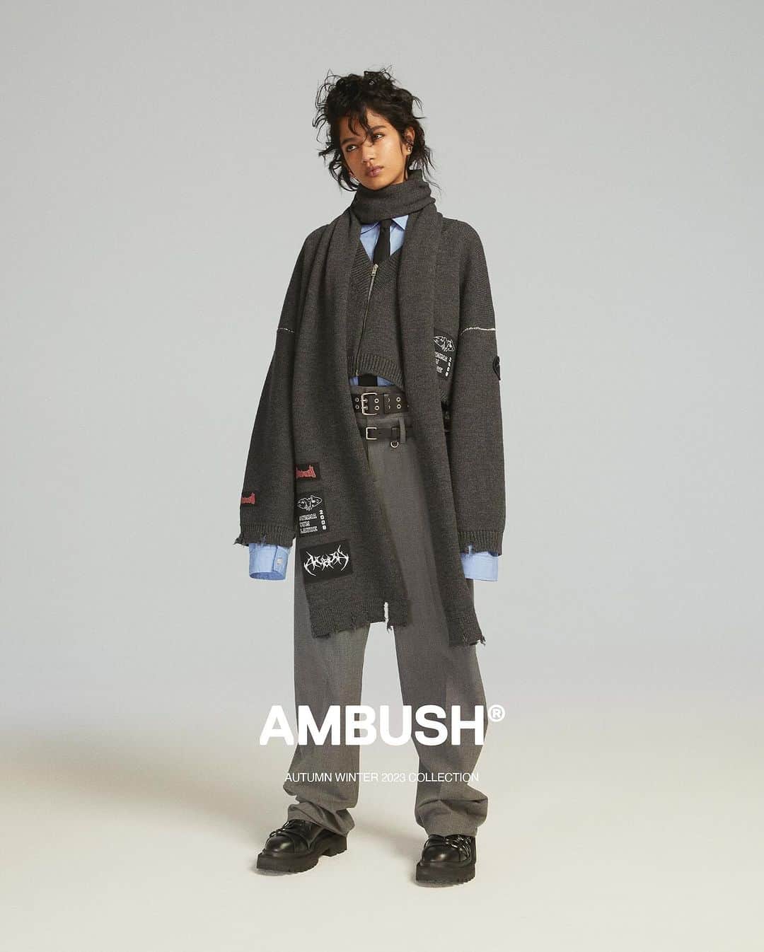 AMBUSHのインスタグラム：「Elongated sleeves, longline hems, and cropped knits for an experimental silhouette. Now available at our WEBSHOP and WORKSHOP.  #AMBUSH AW23 COLLECTION LOOK 16  FELTED KNIT ZIP CARDIGAN CROPPED OVER SHIRT DOUBLE BELTED TROUSERS FELTED KNIT SCARF TAILORING SLIM NECKTIE SPIKE PIERCE FIRE SPIKE PIERCE AMBLEM GROMMET BELT SID LOAFER」
