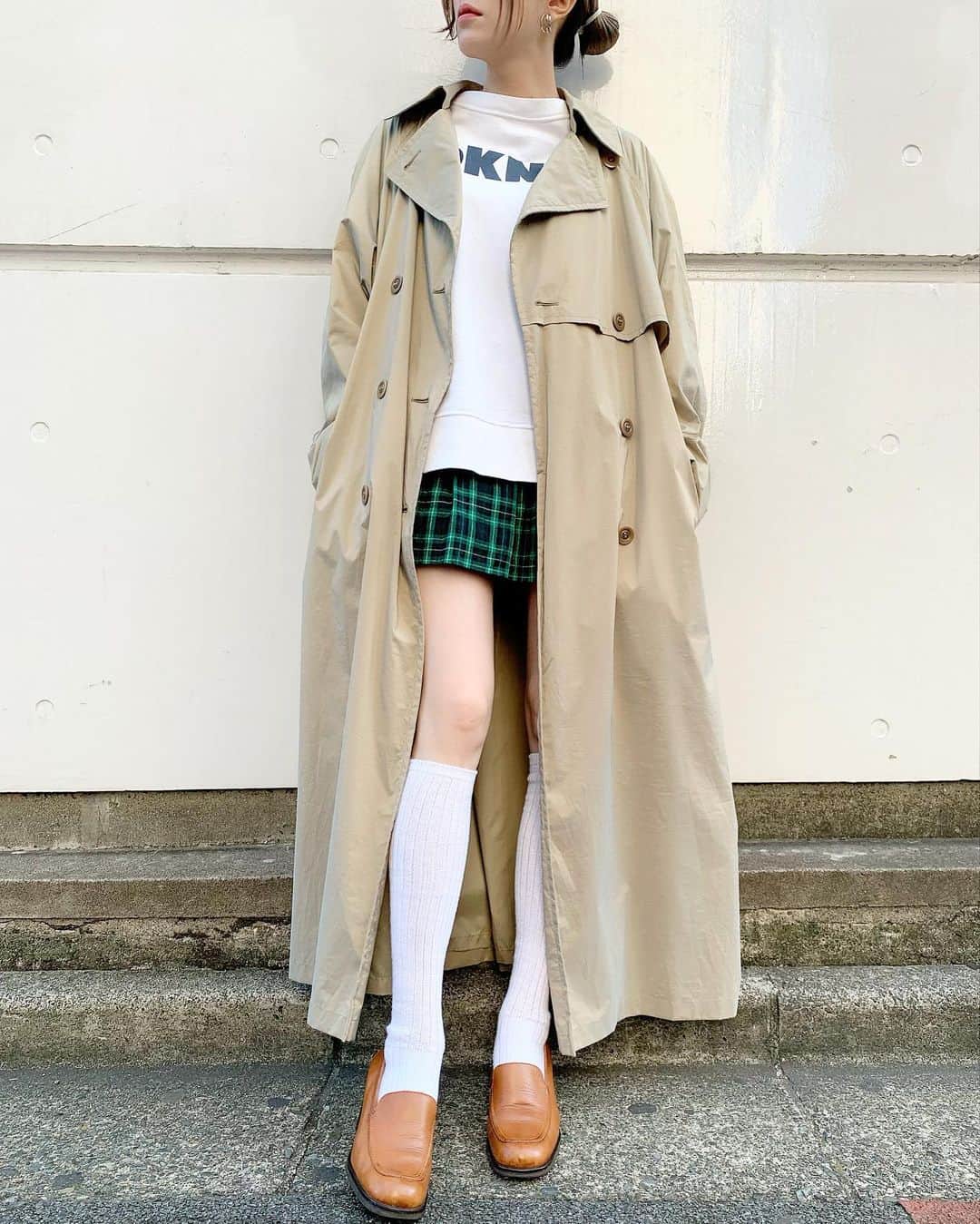 birthdeathのインスタグラム：「New Arrivals  90's LONDON FOG Metallic beige trench coat with liner  90's "DKNY" sweatshirt  60's Plaid pleated mini skirt  90's Camel leather loafers (size 7)  #birthdeath #vintage」