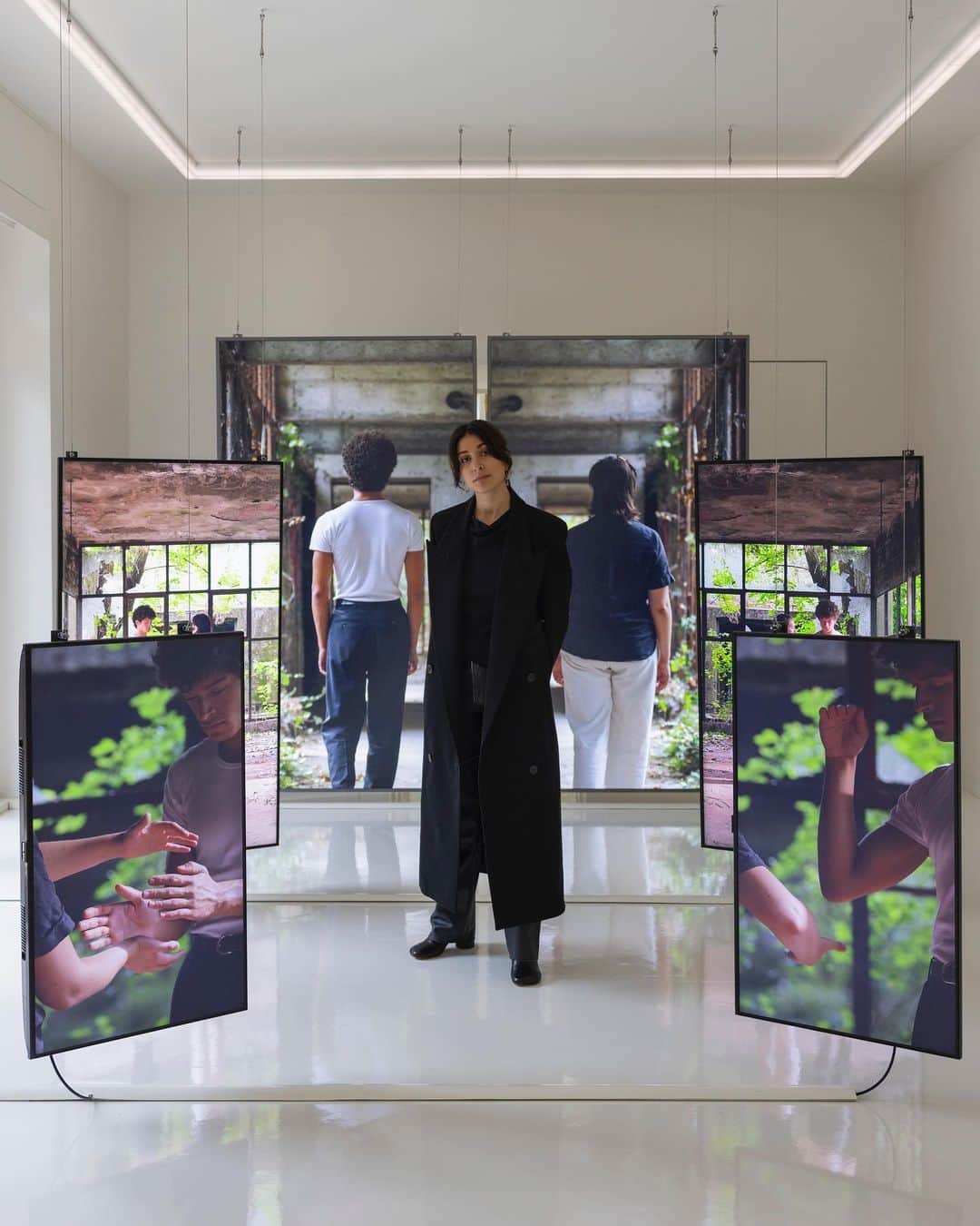 バリーのインスタグラム：「"Sometimes we are eternal", the first solo show of Saudi-American artist Sarah Brahim is now open! Conceived as a walk through her galaxy, the exhibition explores those glimmers of infinity that appear at certain moments in our lives and retraces the past ten years of the artist's life, looking back across the temporal distance that separates this project from a key event that changed its course.   Visit the show at the Villa Heleneum - Bally Foundation until April 28th. Head to the link in bio for visitor information.   Image: Duet with time, videostill, 6-channels video, 2023 Photo: @andrea_rossetti_archive   @sahrab #BallyFoundation #SometimesWeAreEternal #VillaHeleneum #Exhibition #ContemporaryArt @bally」