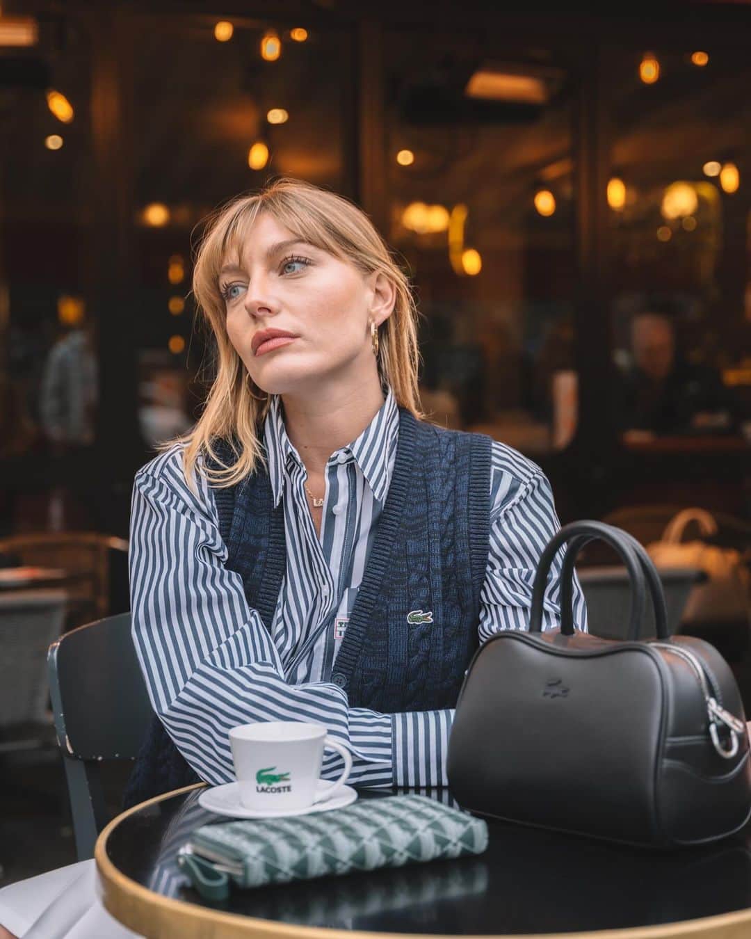 Lacosteのインスタグラム：「Parisian journey with @janiiiiiie and her #LacosteLora handbag. The perfect blend of sporty design and feminine style ✨🐊」