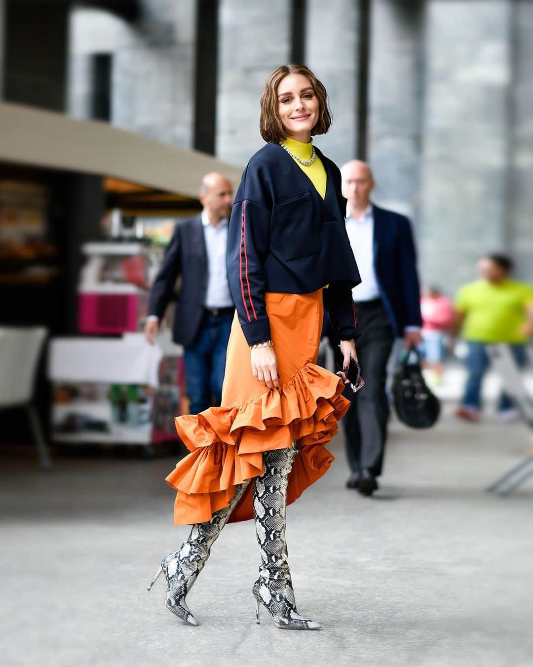スチュアートワイツマンのインスタグラム：「High Drama: Over-the-knee boots are officially back — and they dominated the street style scene during Milan Fashion Week. Pictured here: Olivia Palermo in the ULTRASTUART STRETCH BOOT in stretch printed python-embossed leather. ​  ​  #StuartWeitzman #ULTRASTUART @oliviapalermo #MilanFashionWeek  (Photos by Giovanni Mocchetti/BFA.com)」