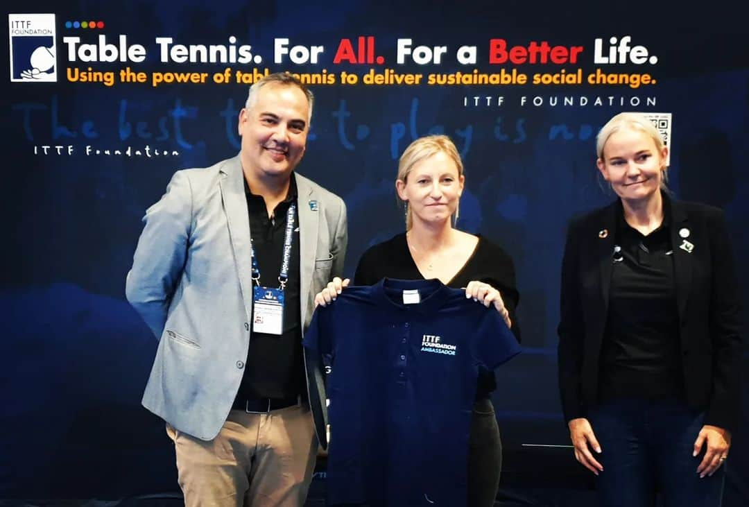 ガリア・ドボラクのインスタグラム：「Meet Galia Dvorak, proudly holding the ITTF Foundation Ambassador t-shirt presented to her by ITTF Foundation President @petraerika and ITTF Foundation Director, @leandroolvech! 🏓  Galia's journey is truly amazing, spanning her Olympic career from 2008 to 2020. Yet, her story extends far beyond her remarkable table tennis achievements, as she passionately embraces the sport's potential for positive transformation. Additionally, she holds a pivotal role as the Deputy General of the European Table Tennis Union, inspiring us well beyond her professional athlete career.  Join us on this ongoing journey as Galia continues to bring the ITTF Foundation's vision to life! Together, we hope to make a meaningful difference in the world through the medium of table tennis.   #TTCanChangeLives #TableTennis #PingPong #ambassador」