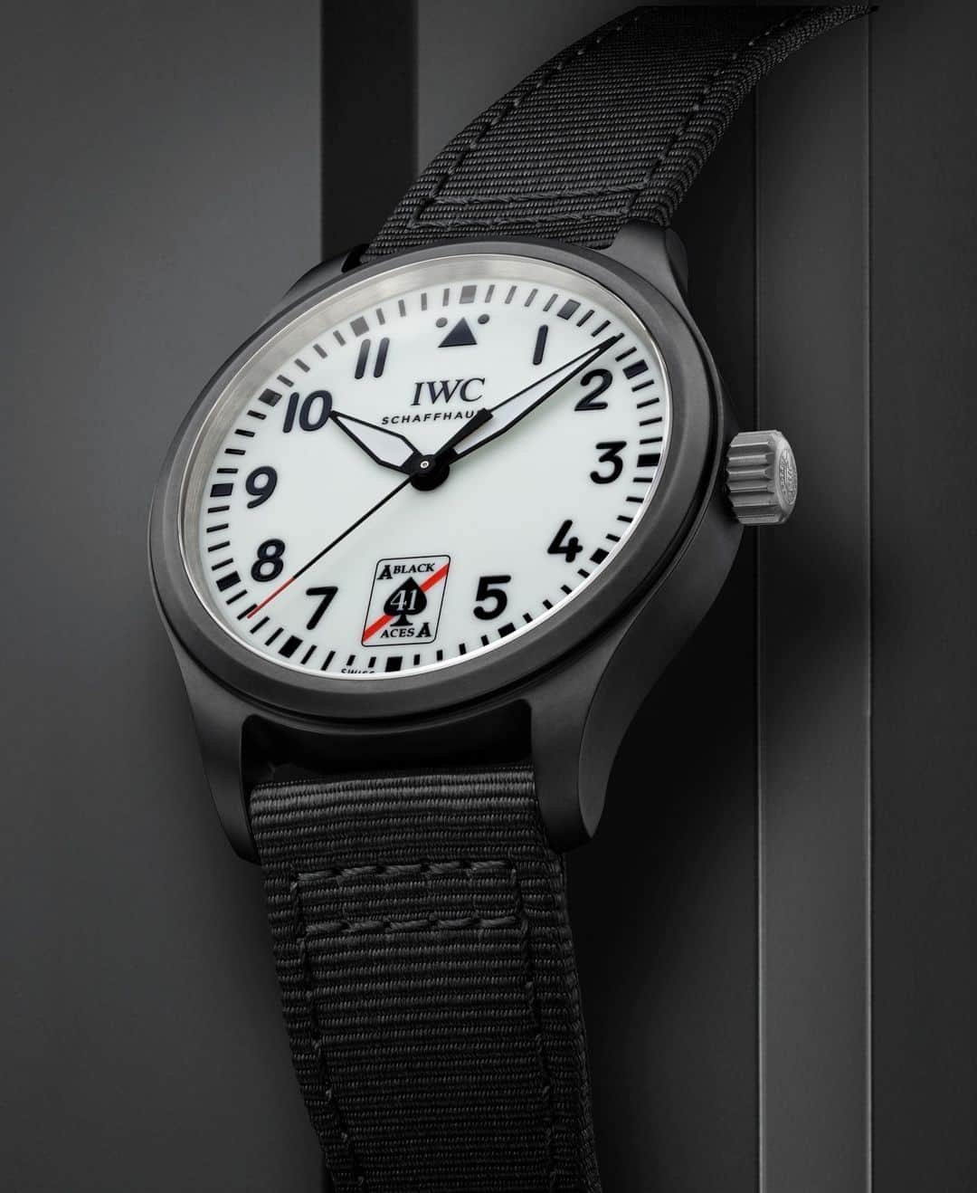IWCのインスタグラム：「Pilot's Watch Automatic 41 Black Aces  • Soft iron inner case to protect against magnetic fields • Black textile strap with pin buckle in sandblasted stainless steel • High-efficiency bidirectional pawl winding system  🔗Link in Bio to our e-com exclusive (Ref. IW326905)  #IWCpilot | #IWCwatches」