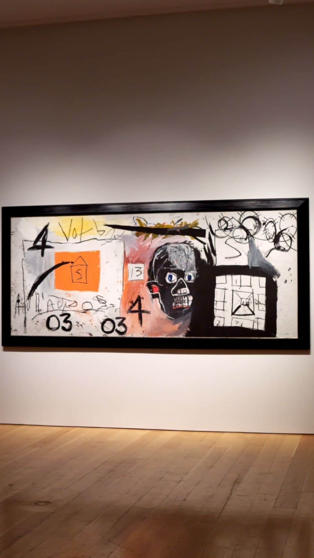クリスティーズのインスタグラム：「Jean-Michel Basquiat’s ‘Untitled’ painting from 1981 will be a leading highlight of the New York 21st Century Evening Sale   Completed when he was barely 20 years old, this large-scale work from Jean-Michel Basquiat displays all the energy, excitement, and ingenuity of a young artist on the verge of art-world superstardom. The monumental canvas includes many of the visual elements that would become an important part of his oeuvre: scrawled text, archetypal symbols, barbed wire and a skelly court capture the energy of the streets of New York, while the electric blue eyes of the thickly painted head keep us fixed in thought.   ‘Untitled’ by Jean‐Michel Basquiat joins an incredible selection of works from cutting-edge contemporary stars in the New York 21st Century Evening Sale.   See this piece and more from the 20/21 sale series on tour across the globe - view the schedule via our LinkinBio!   21st Century Evening Sale | 7 November | New York」