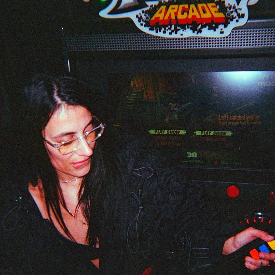 Dazed Magazineさんのインスタグラム写真 - (Dazed MagazineInstagram)「@COUCOUCHLOE arrives at @NQ64arcadebars in Shoreditch and almost immediately spills a drink over herself 👾⁠ ⁠ Although her ultra-gorpcore @anaselivanova jacket is collateral damage, she styles it out – her skin and hair glisten with a glass’s worth of booze and she adds a slick of lipgloss to finish the wet look. The bar we’re in is dark and neon-lit with flashing retro consoles and a very loud Chief Keef soundtrack.⁠ ⁠ The @nuxxe_ collective member has just released mixtape Fever Dream, a collection that is “two years of friends and life and everything”, she says. It draws together an impressive crop of collaborators including @eartheater 645ar @louisbrodinski @iamrealnene and mop-haired teen rapper @mattox⁠ ⁠ The cover art is a sketched caricature of COUCOU CHLOE, with an exaggeratedly large forehead, droopy-lidded eyes and a plumped-up, dissociative pout. “I liked the idea of a caricature, or a grotesque, as a way to let go... It was really interesting to see the perspective of someone who doesn’t know me at all. It's like, ‘What do you see?’”⁠ ⁠ Read the full interview through the link in our bio 🔗⁠ ⁠ ✍️ @felicitaaaay⁠ 📷 @hattirex⁠」10月7日 1時02分 - dazed