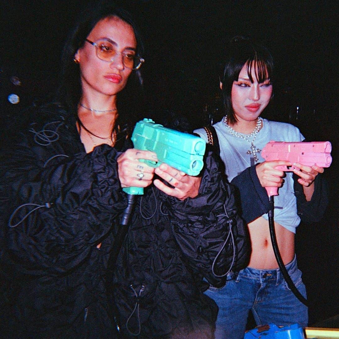 Dazed Magazineさんのインスタグラム写真 - (Dazed MagazineInstagram)「@COUCOUCHLOE arrives at @NQ64arcadebars in Shoreditch and almost immediately spills a drink over herself 👾⁠ ⁠ Although her ultra-gorpcore @anaselivanova jacket is collateral damage, she styles it out – her skin and hair glisten with a glass’s worth of booze and she adds a slick of lipgloss to finish the wet look. The bar we’re in is dark and neon-lit with flashing retro consoles and a very loud Chief Keef soundtrack.⁠ ⁠ The @nuxxe_ collective member has just released mixtape Fever Dream, a collection that is “two years of friends and life and everything”, she says. It draws together an impressive crop of collaborators including @eartheater 645ar @louisbrodinski @iamrealnene and mop-haired teen rapper @mattox⁠ ⁠ The cover art is a sketched caricature of COUCOU CHLOE, with an exaggeratedly large forehead, droopy-lidded eyes and a plumped-up, dissociative pout. “I liked the idea of a caricature, or a grotesque, as a way to let go... It was really interesting to see the perspective of someone who doesn’t know me at all. It's like, ‘What do you see?’”⁠ ⁠ Read the full interview through the link in our bio 🔗⁠ ⁠ ✍️ @felicitaaaay⁠ 📷 @hattirex⁠」10月7日 1時02分 - dazed