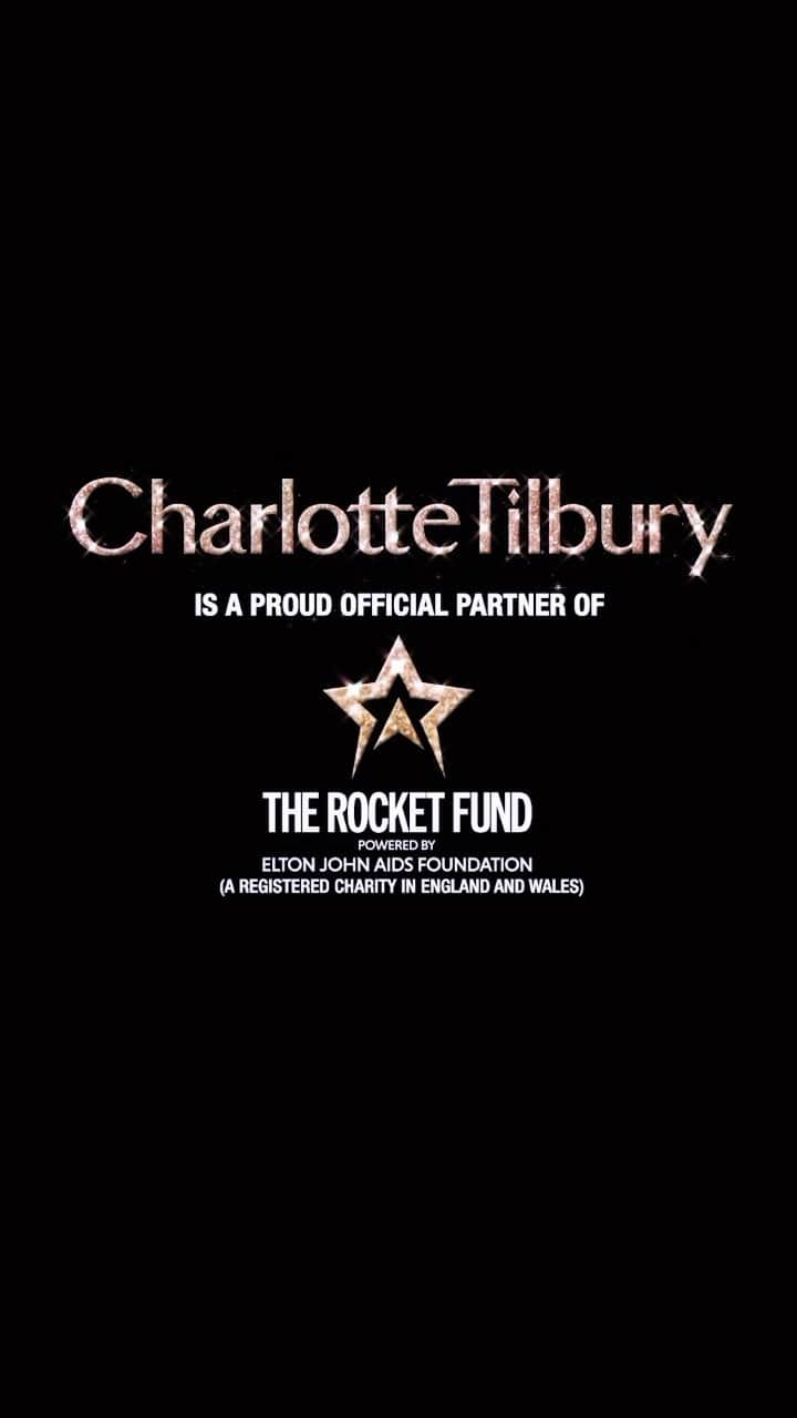 エルトン・ジョンのインスタグラム：「💄🚀 CHARLOTTE TILBURY X THE ROCKET FUND 🚀💄  Darlings, my NEW! holiday campaign is all about GIVING BACK THE MAGIC!! 🌟 It is our biggest honour and privilege to support The Rocket Fund as their Official Founding Beauty Partner, and I’m so pleased to have made a personal contribution to help TURBO-CHARGE their mission to end AIDS for all! 🌎  This holiday season, I am encouraging everyone to GIVE BACK THE MAGIC – if you can, please support @ejaf’s incredible and transformative campaign, The Rocket Fund, to help change the lives and futures of millions of people around the world! 🚀🌎  THANK YOU again, darling @eltonjohn + @davidfurnish, for collaborating with me on this meaningful partnership!! 💫❤️ To learn more, visit @ejaf now!  Charlotte Tilbury Beauty is a proud official partner of The Rocket Fund, powered by the Elton John AIDS Foundation.  #CharlotteTilbury #ClubMagic #StepIntoMagic #CharlotteTilburyHoliday」